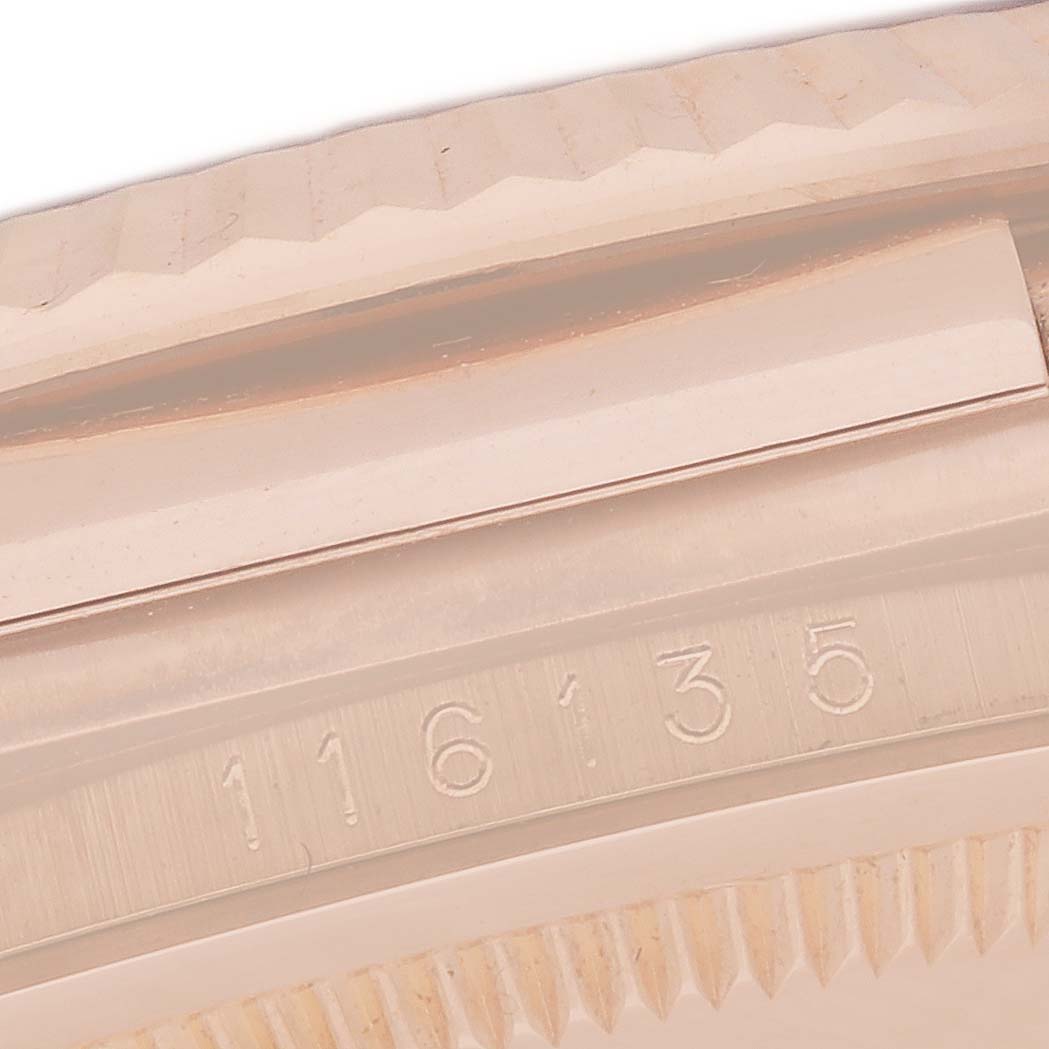 This image shows the side of the case and a part of the bezel of a Rolex President 116135 Men's Rose Gold Mother of Pearl Dial 116135 Men's Rose Gold Mother of Pearl Dial model, highlighting the model number.
