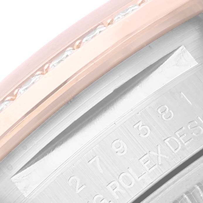 The image shows a close-up of the bezel and engraved edge on a Rolex Datejust 279381 Women's Steel and Gold (two tone) Mother of Pearl Dial 279381 Women's Steel and Gold (two tone) Mother of Pearl Dial watch.