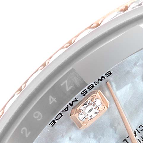 This close-up image shows the edge of the dial and part of the bezel of a Rolex Datejust 279381 Women's Steel and Gold (two tone) Mother of Pearl Dial 279381 Women's Steel and Gold (two tone) Mother of Pearl Dial watch, highlighting the "Swiss Made" label.