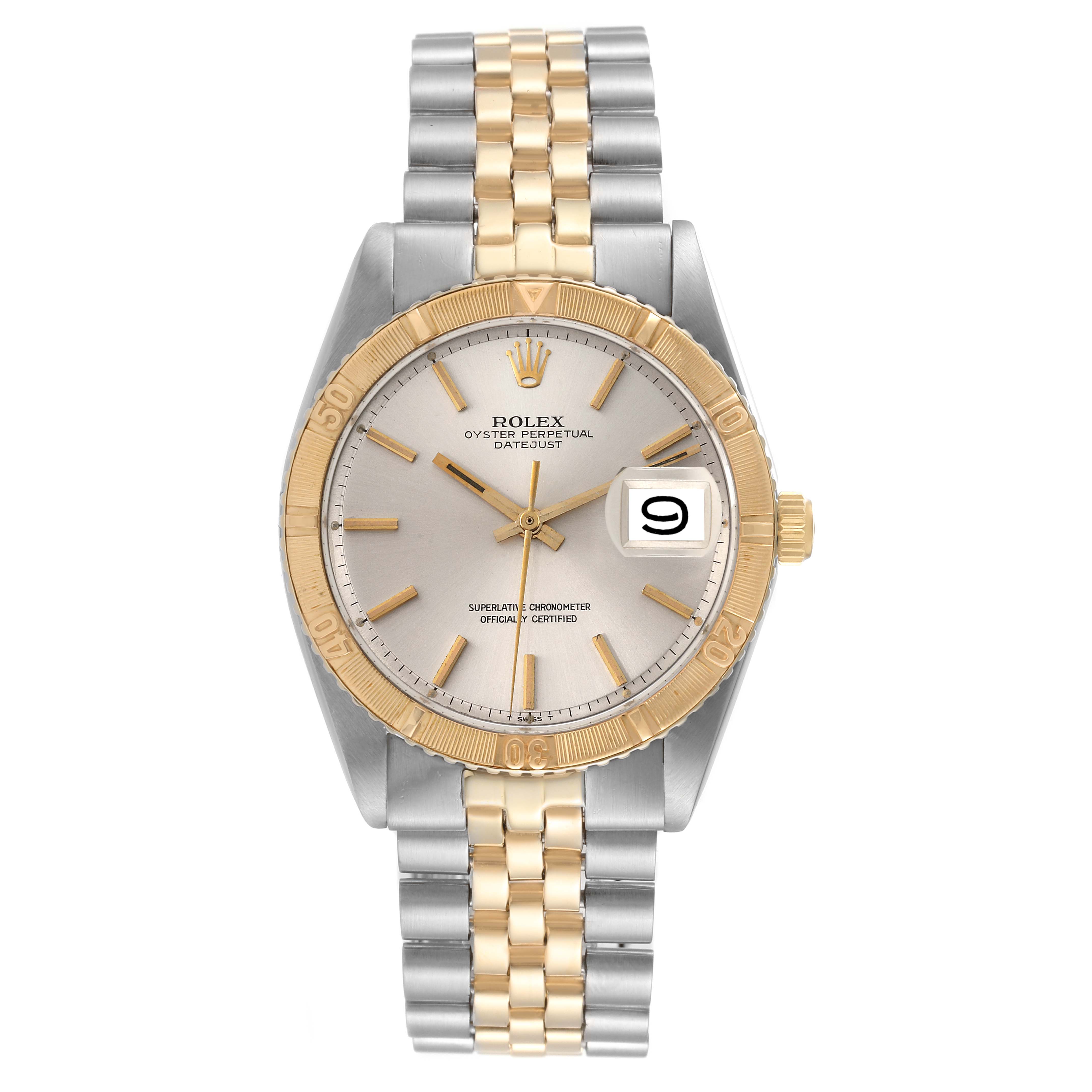 The Rolex Turn-o-Graph 1625 Men's Steel and Gold (two tone) Silver Dial 1625 Men's Steel and Gold (two tone) Silver Dial watch is shown from a front angle, featuring its dial, bezel, and two-tone bracelet.