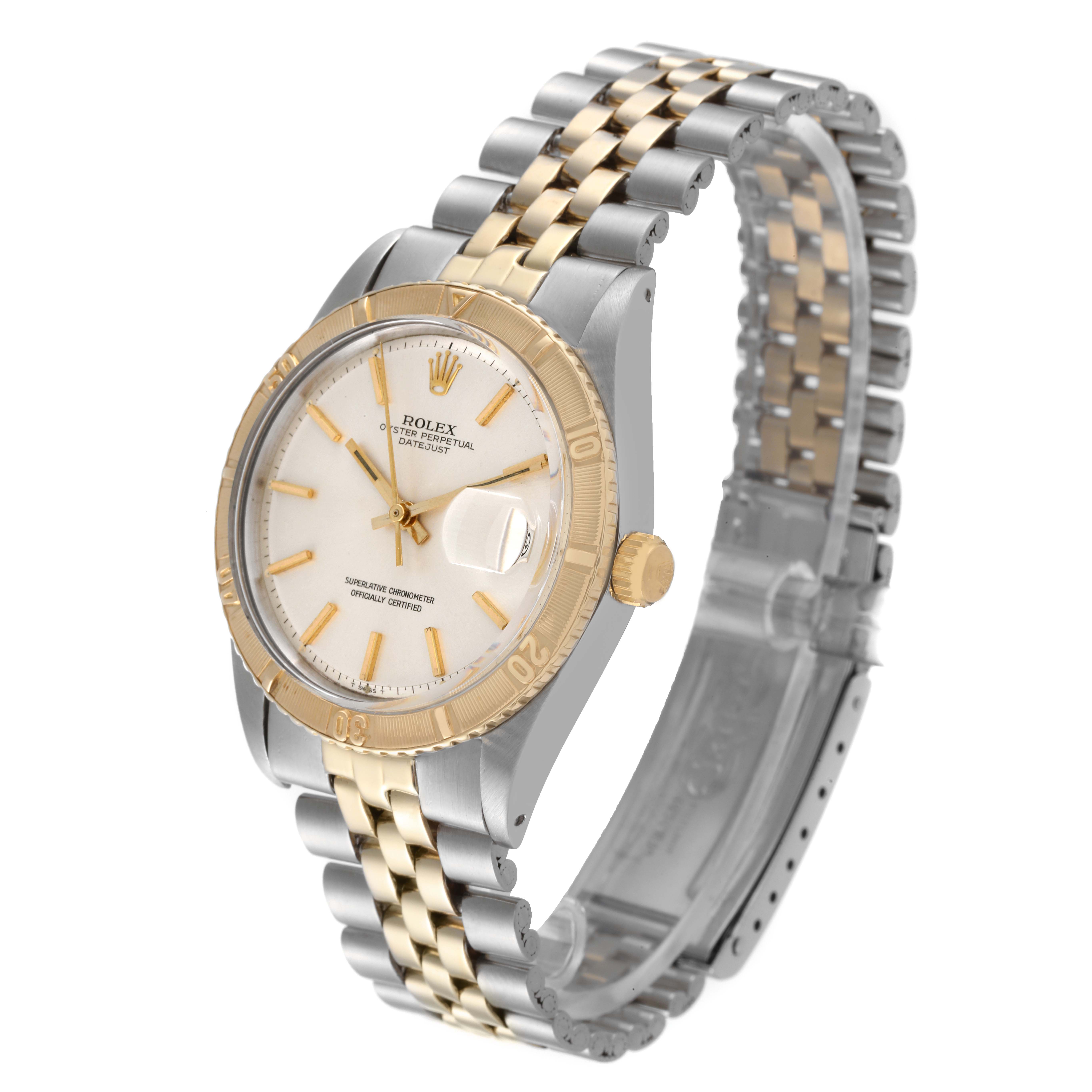 The image shows a side angle of the Rolex Turn-o-Graph 1625 Men's Steel and Gold (two tone) Silver Dial 1625 Men's Steel and Gold (two tone) Silver Dial wristwatch, highlighting its bezel, dial, and two-tone metal bracelet.