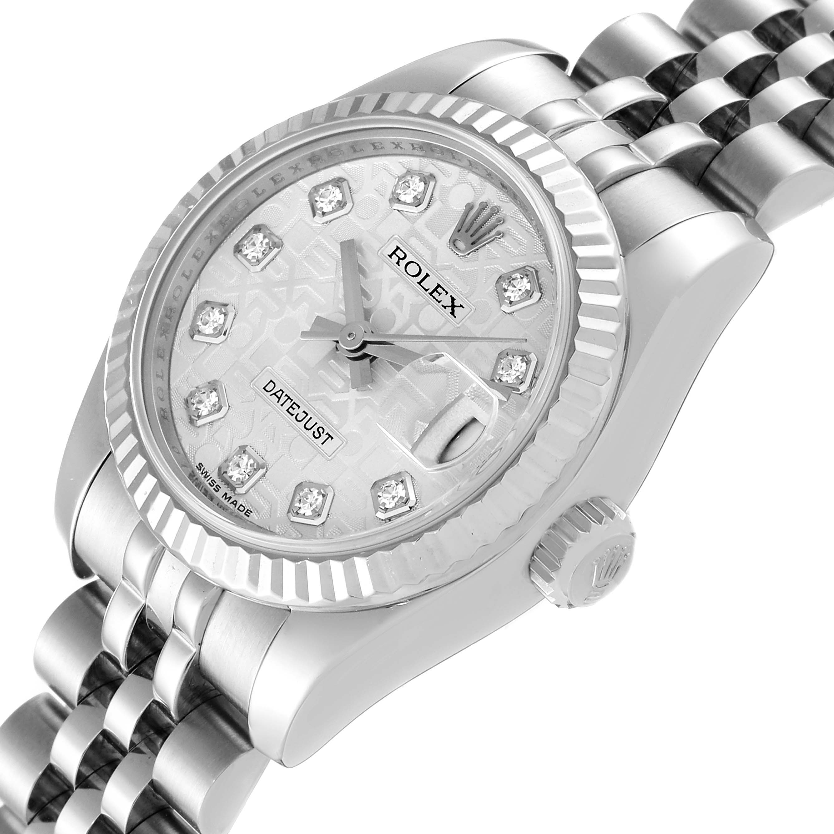 The image shows a Rolex Datejust 179174 Women
s Stainless Steel Silver Dial 179174 Women
s Stainless Steel Silver Dial watch from a slightly angled top-down view, displaying the dial, bezel, and part of the bracelet.