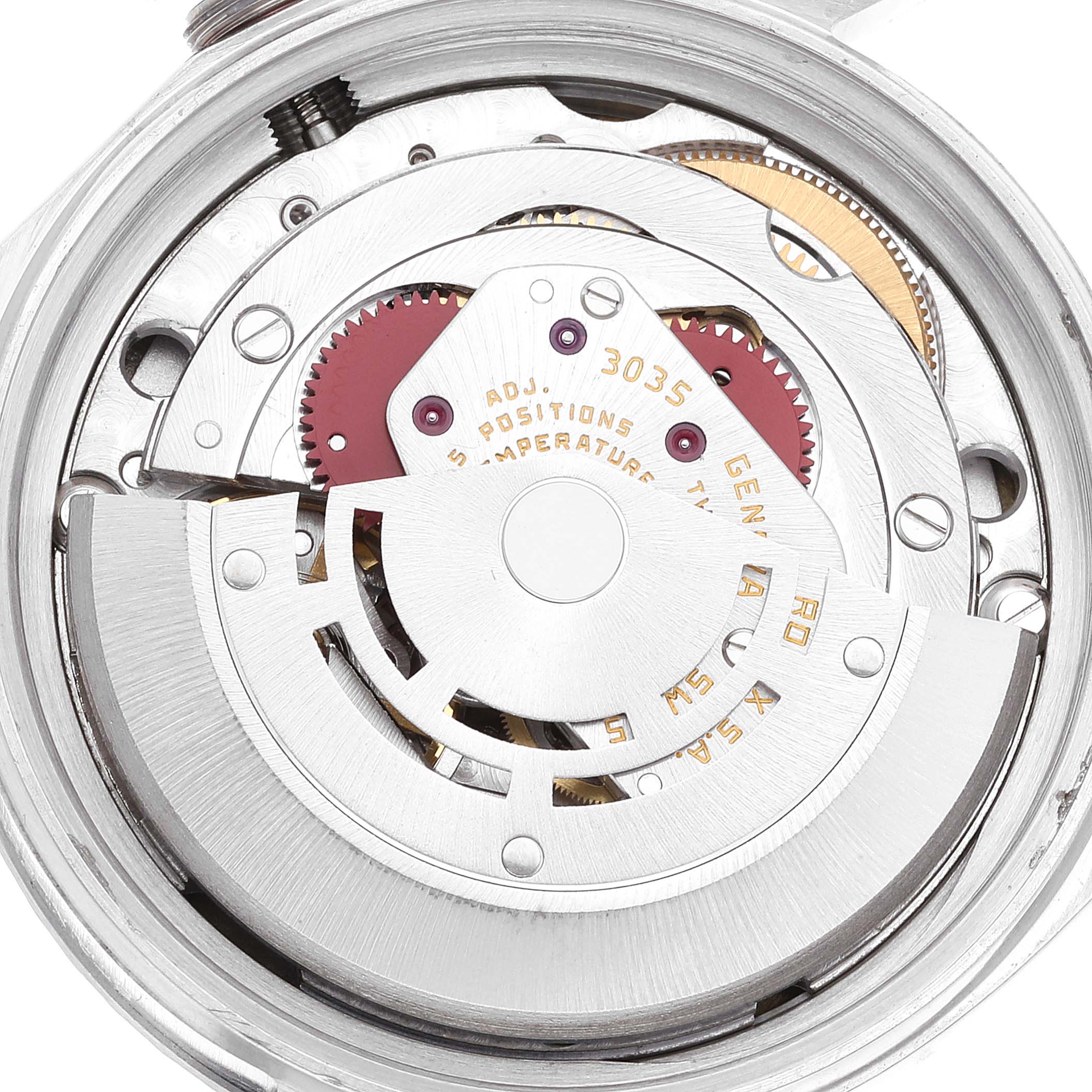 This image shows a top view of the interior mechanism of a Rolex Datejust 16030 Men's Stainless Steel White Dial 16030 Men's Stainless Steel White Dial watch, highlighting the rotor and gears.