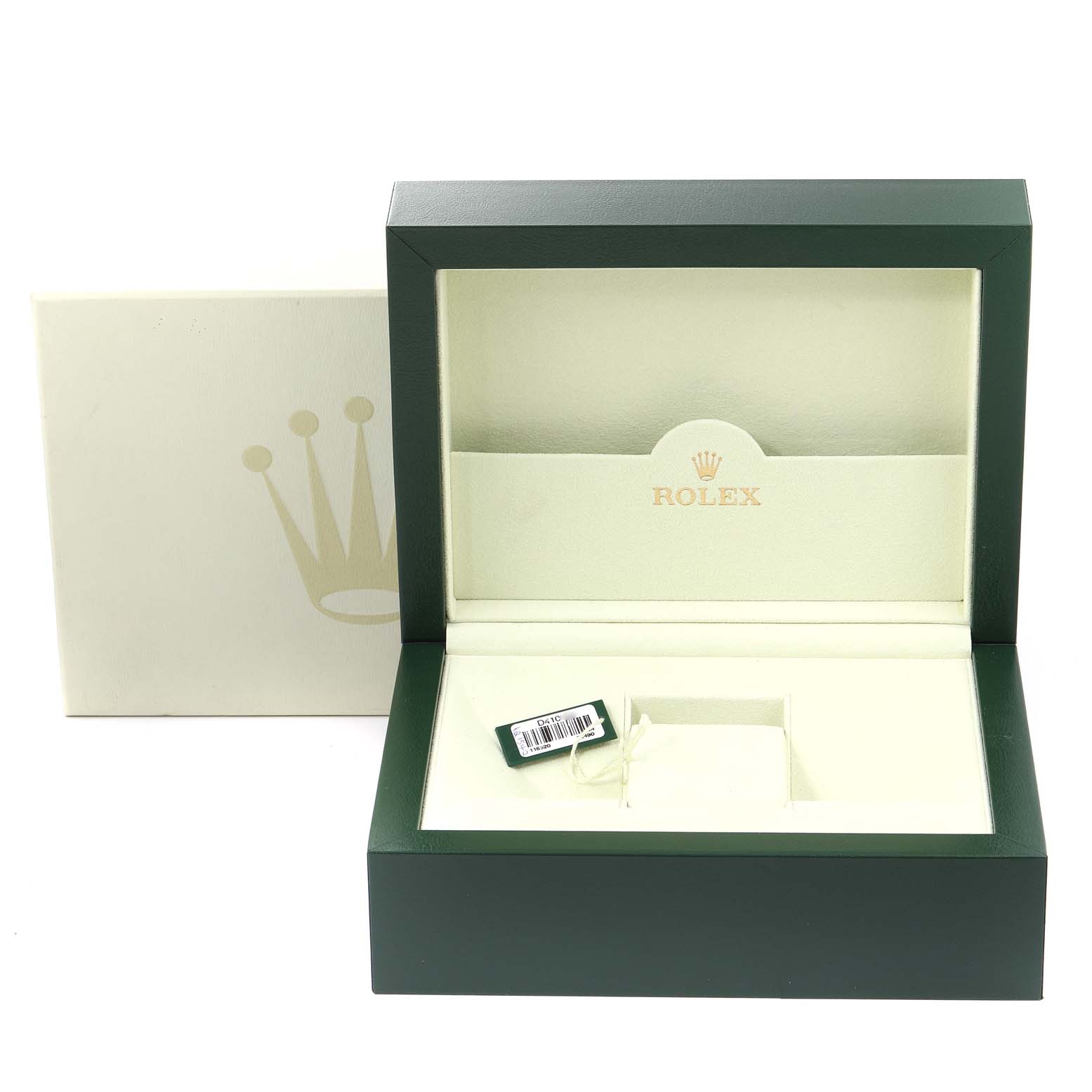 This image shows an open green Rolex watch case for the Daytona model, with an outer box and tag inside.