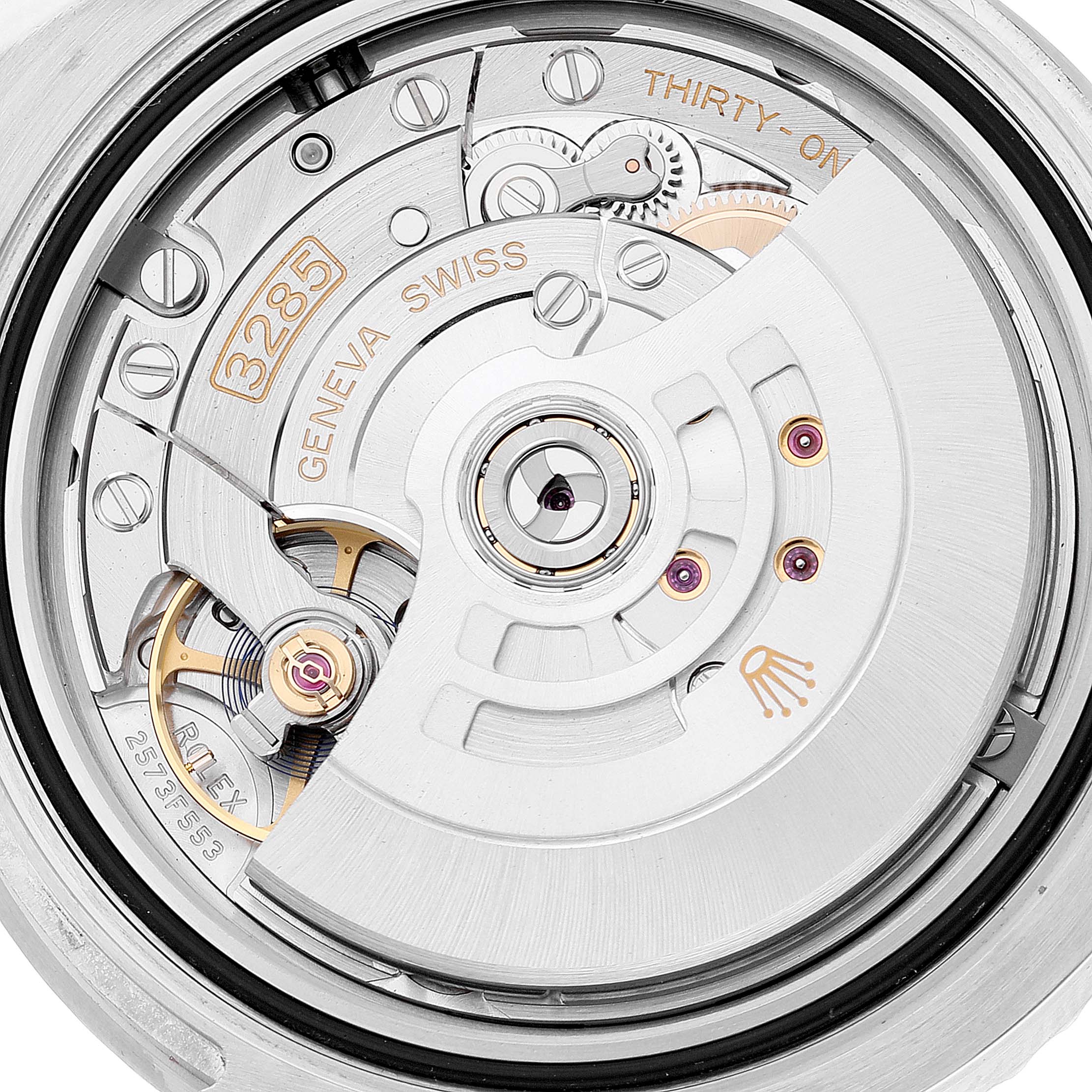 The image shows a close-up view of the Rolex GMT-Master 126710 Men
s Stainless Steel Black Dial 126710 Men
s Stainless Steel Black Dial movement, specifically the 3285 caliber.