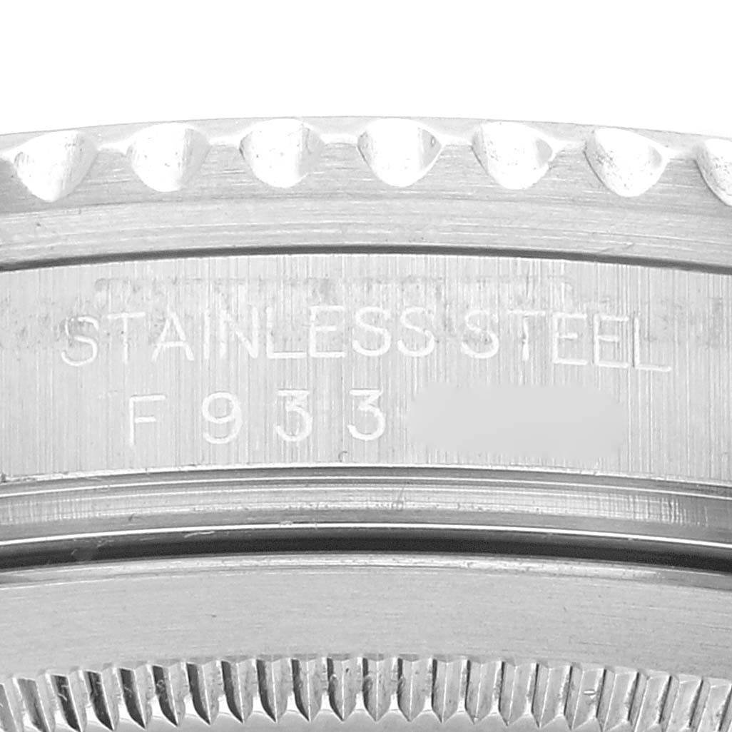 This image shows a close-up angle of the case and bezel edge of a Rolex GMT-Master 16710 Men's Stainless Steel Black Dial 16710 Men's Stainless Steel Black Dial watch.