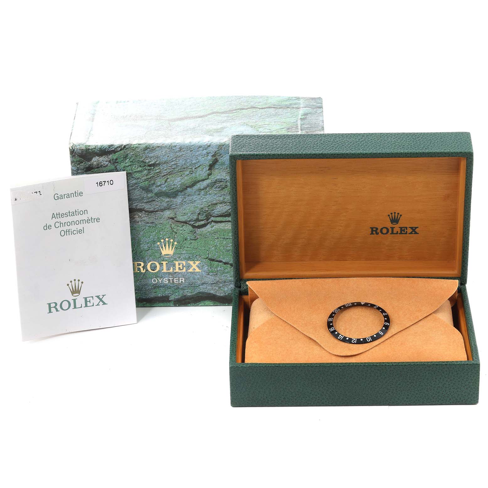 The image shows a Rolex GMT-Master 16710 Men's Stainless Steel Black Dial 16710 Men's Stainless Steel Black Dial bezel insert, its box, and warranty papers.