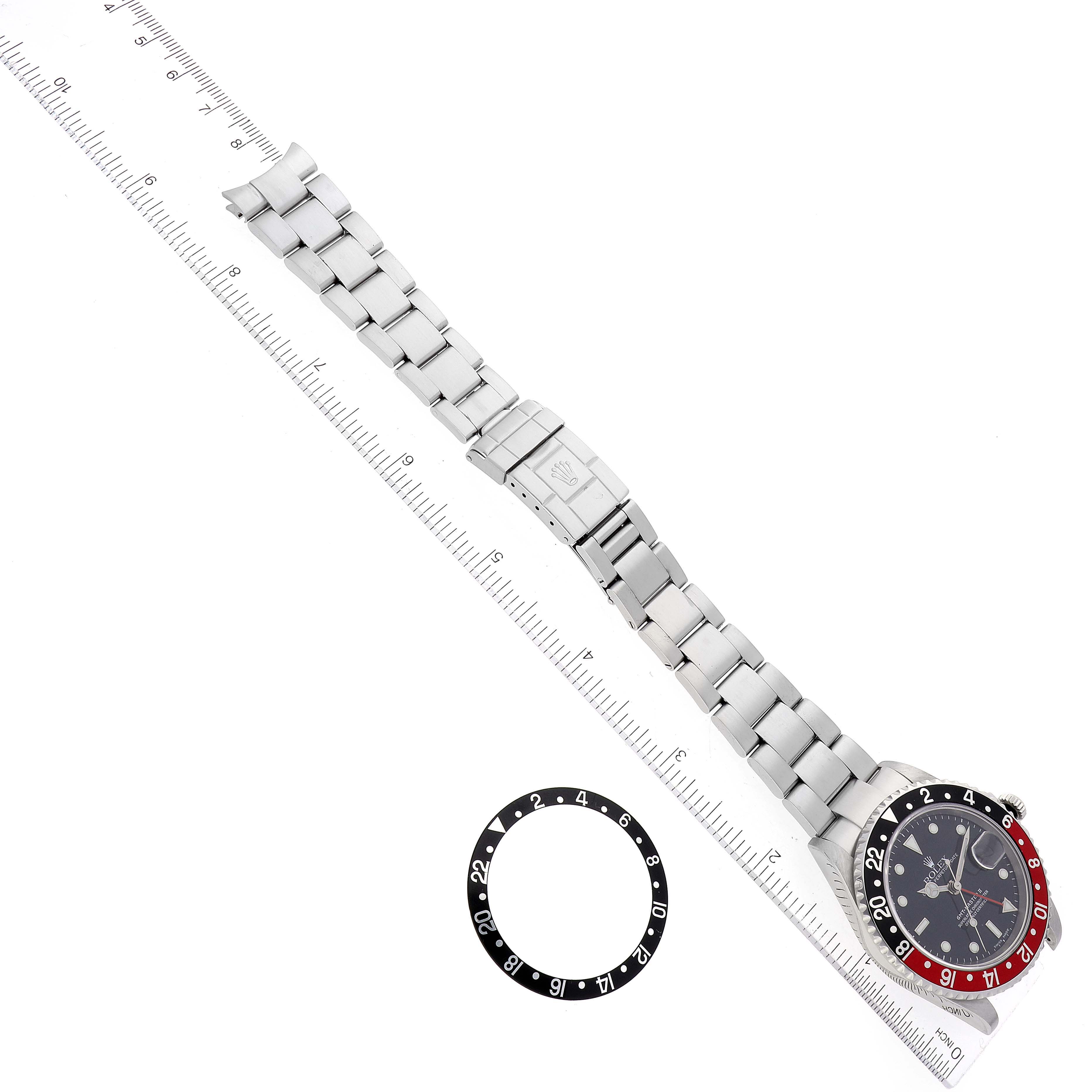 The image shows a Rolex GMT-Master 16710 Men's Stainless Steel Black Dial 16710 Men's Stainless Steel Black Dial watch with its bezel ring removed, viewed from a top-down angle.