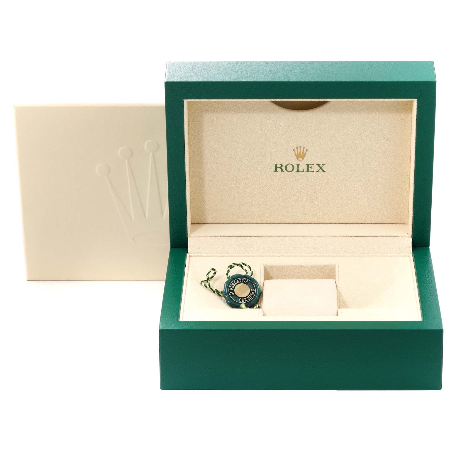 The image shows an open green Rolex box for the Oyster Perpetual model, with a tag inside and the Rolex logo on the interior lining.