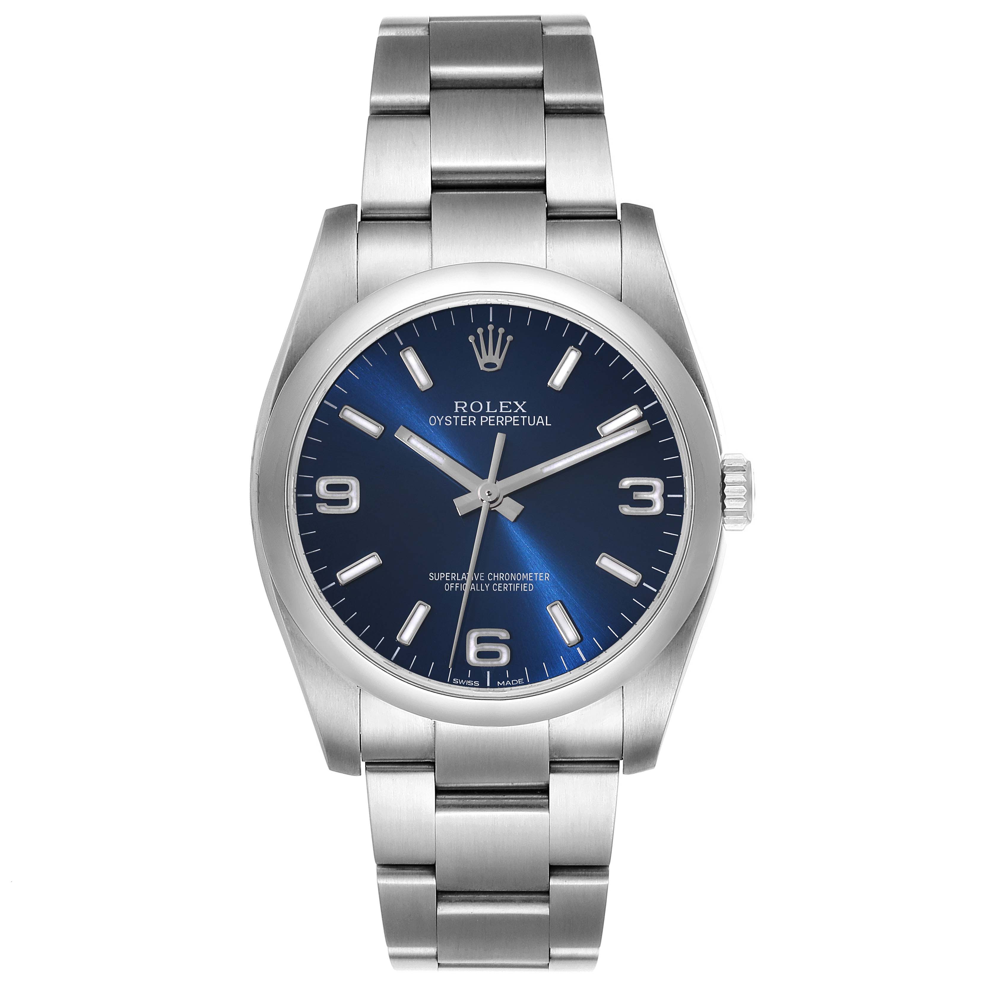 The image shows a front view of a Rolex Oyster Perpetual 116000 Men's Stainless Steel Blue Dial 116000 Men's Stainless Steel Blue Dial watch with a blue dial and stainless steel bracelet.