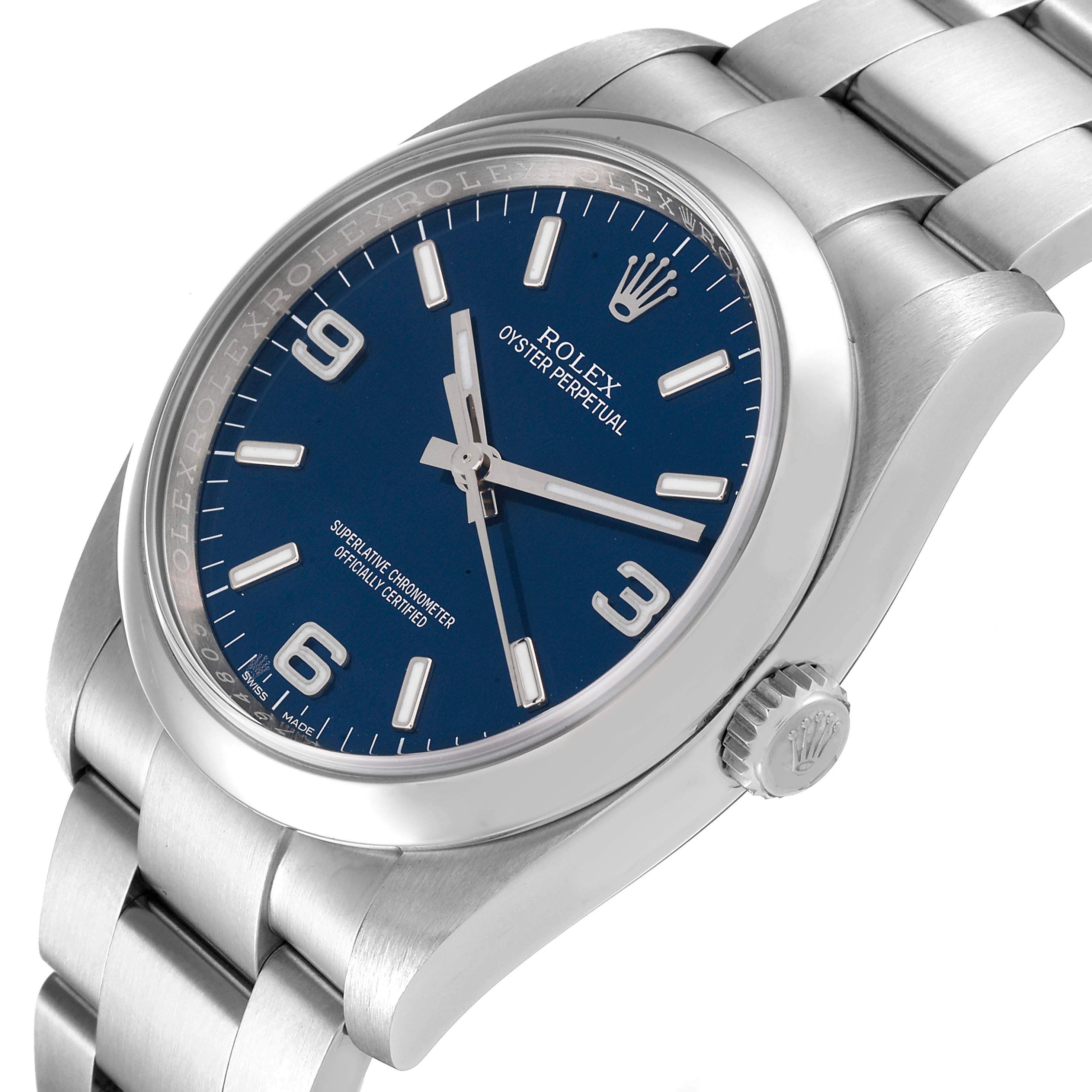 The image shows a Rolex Oyster Perpetual 116000 Men's Stainless Steel Blue Dial 116000 Men's Stainless Steel Blue Dial watch at a slight angle, highlighting its blue dial, bezel, and part of the bracelet.
