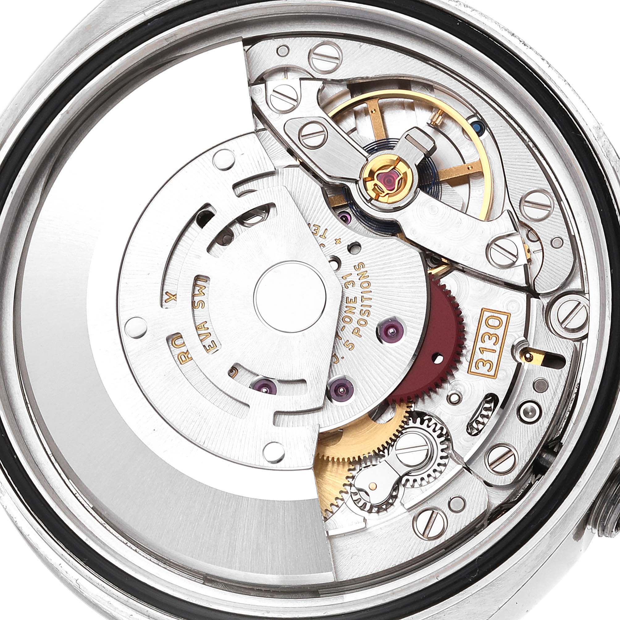 The image shows the inner mechanism of the Rolex Oyster Perpetual 116000 Men's Stainless Steel Blue Dial 116000 Men's Stainless Steel Blue Dial watch, focusing on the movement and gears.