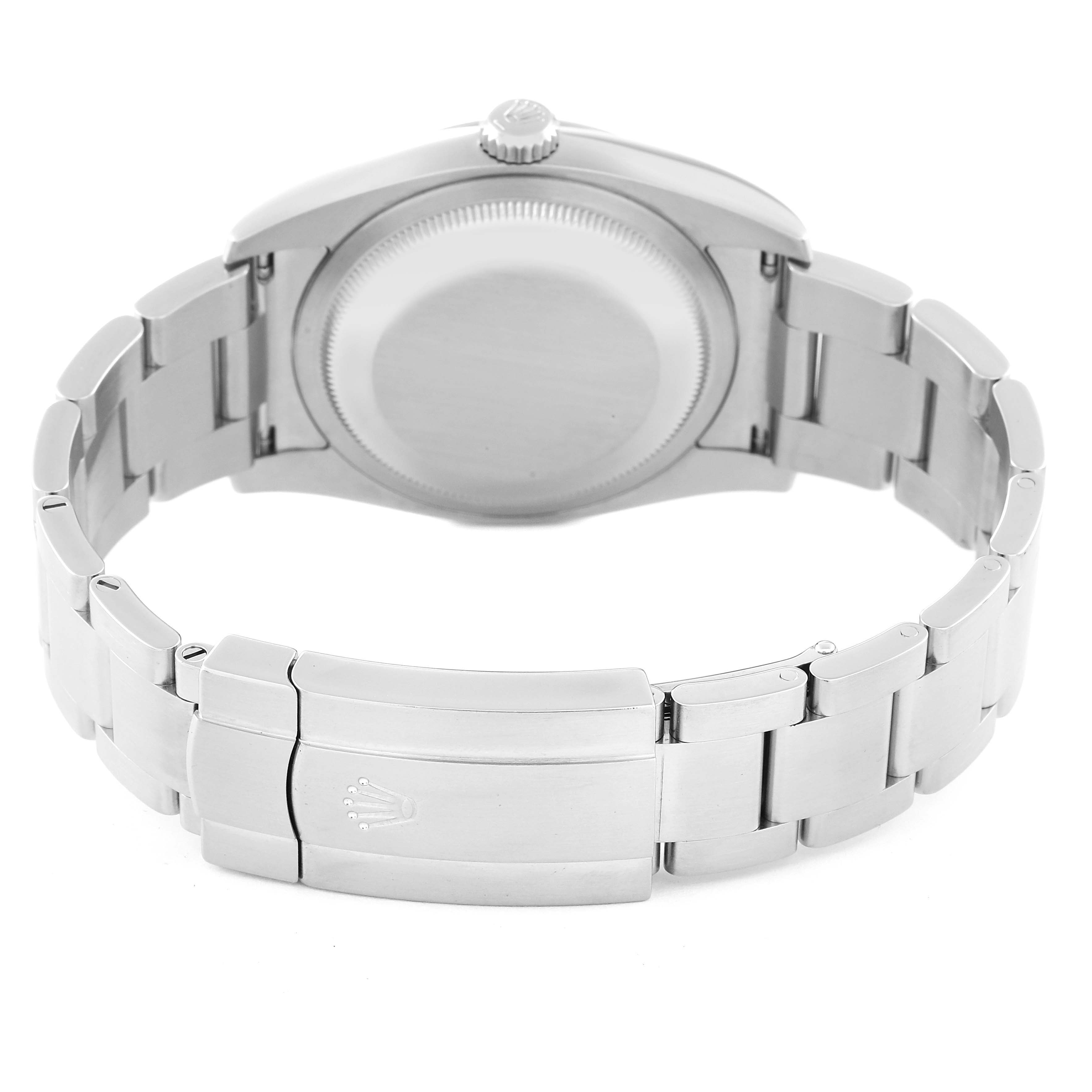 The image shows the back and clasp of a Rolex Oyster Perpetual 116000 Men's Stainless Steel Blue Dial 116000 Men's Stainless Steel Blue Dial watch, highlighting the bracelet and case back.