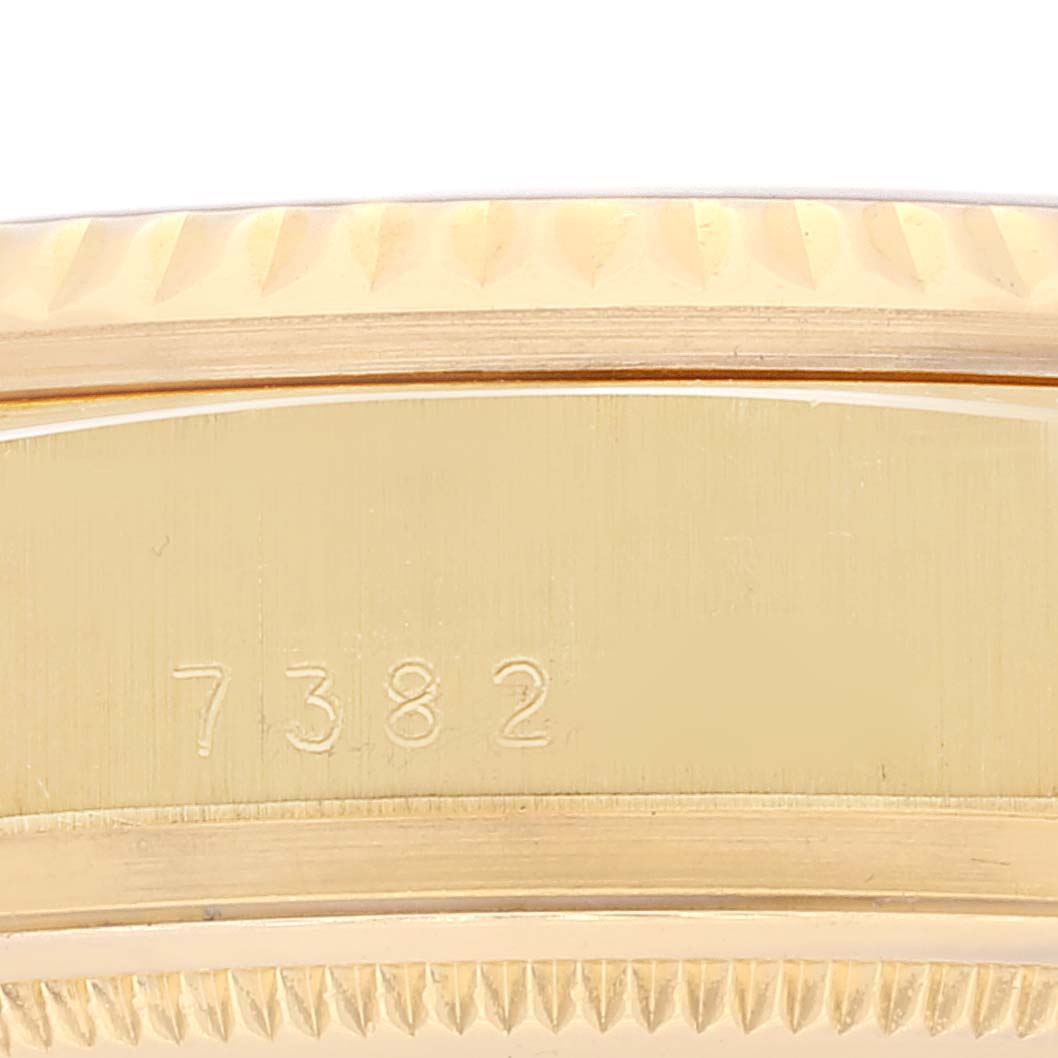 The image shows a close-up of the side of a Rolex President 18038 Men's Yellow Gold Champagne Dial 18038 Men's Yellow Gold Champagne Dial model watch, highlighting the reference number "7382" and parts of the bezel.