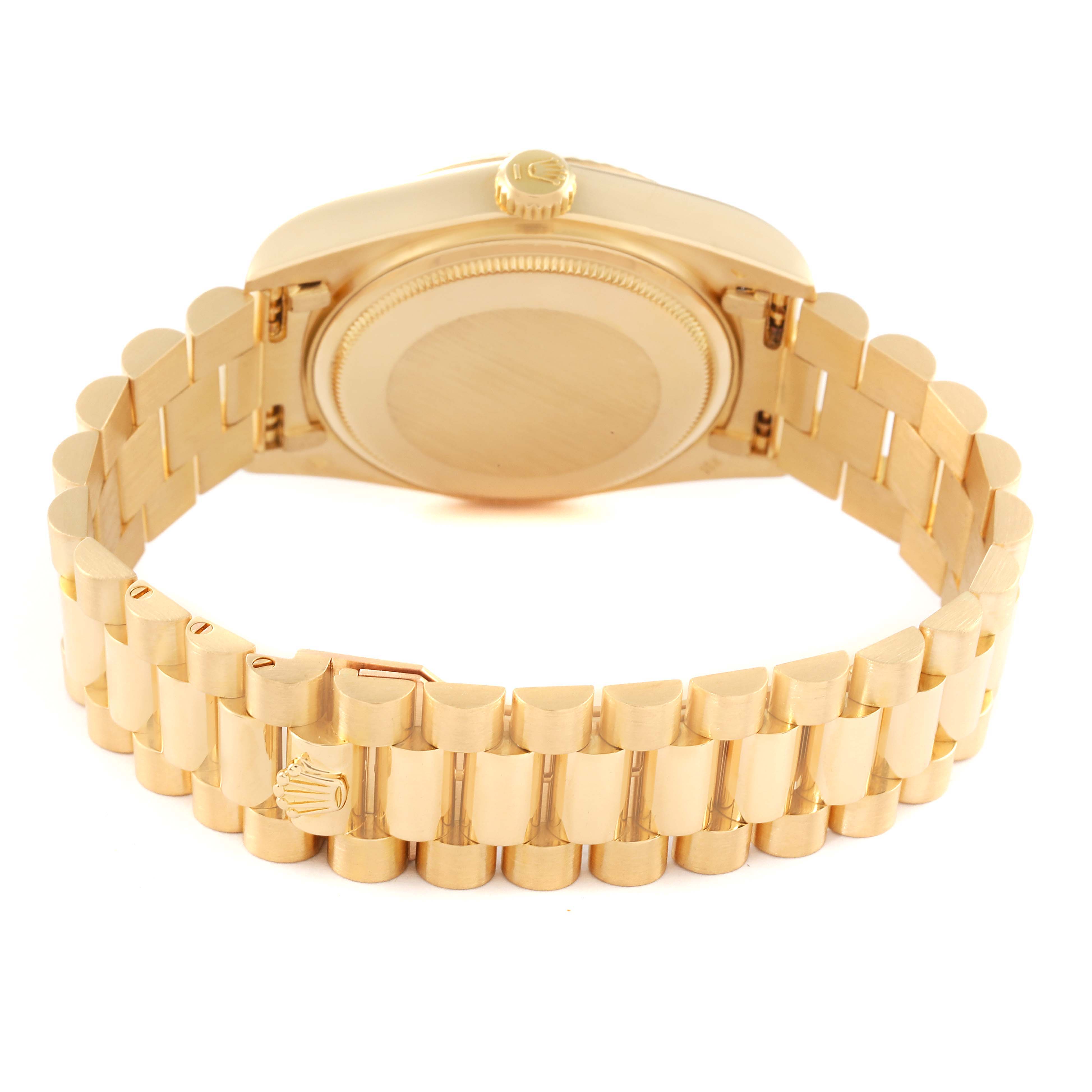 The image shows the back of a gold Rolex President 18038 Men's Yellow Gold Champagne Dial 18038 Men's Yellow Gold Champagne Dial model watch, highlighting its case back and bracelet.