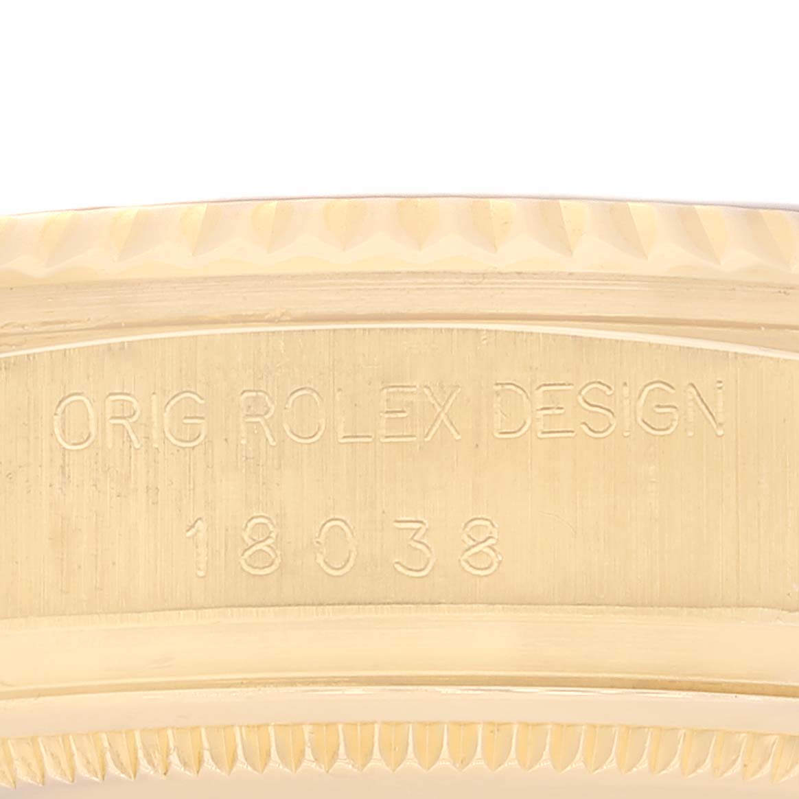 This image shows a close-up of the case side, displaying the "ORIG ROLEX DESIGN" and model number 18038 for the Rolex President 18038 Men's Yellow Gold Champagne Dial 18038 Men's Yellow Gold Champagne Dial watch.