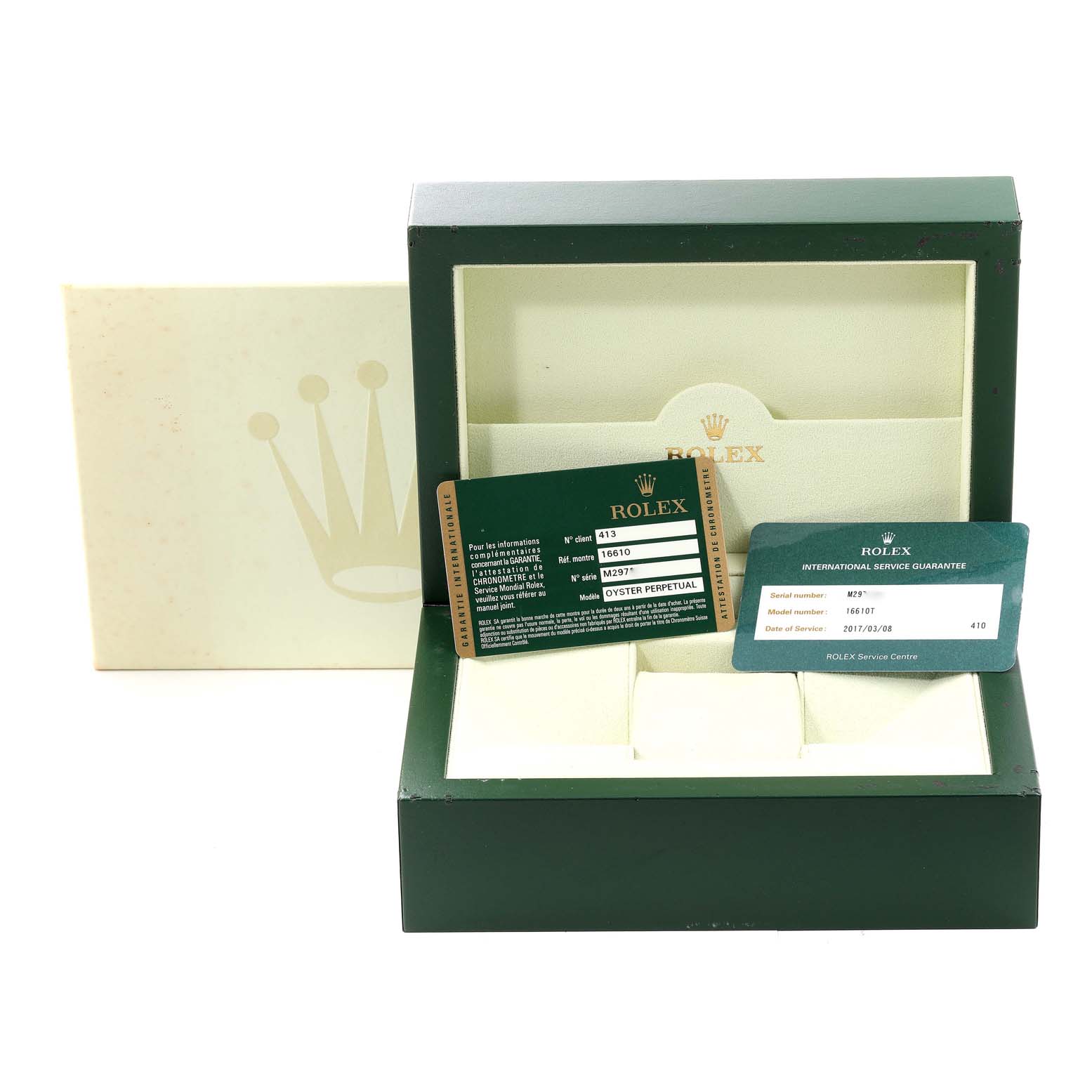 This image shows the opened packaging for a Rolex Submariner 16610 Men's Stainless Steel Black Dial 16610 Men's Stainless Steel Black Dial watch, including the box and warranty cards.