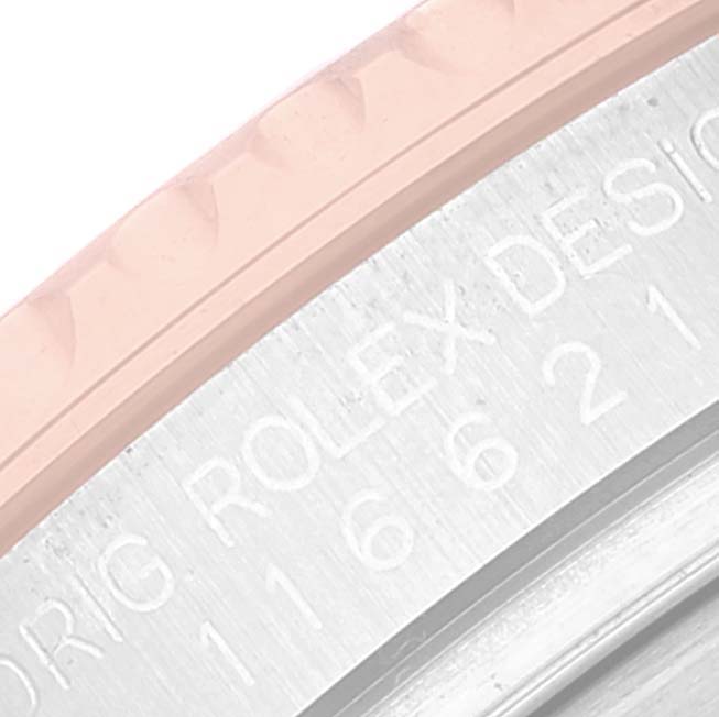 The image shows a close-up of the bezel and part of the case of a Rolex Yacht-Master 116621 Men's Steel and Gold (two tone) Brown Dial 116621 Men's Steel and Gold (two tone) Brown Dial watch.