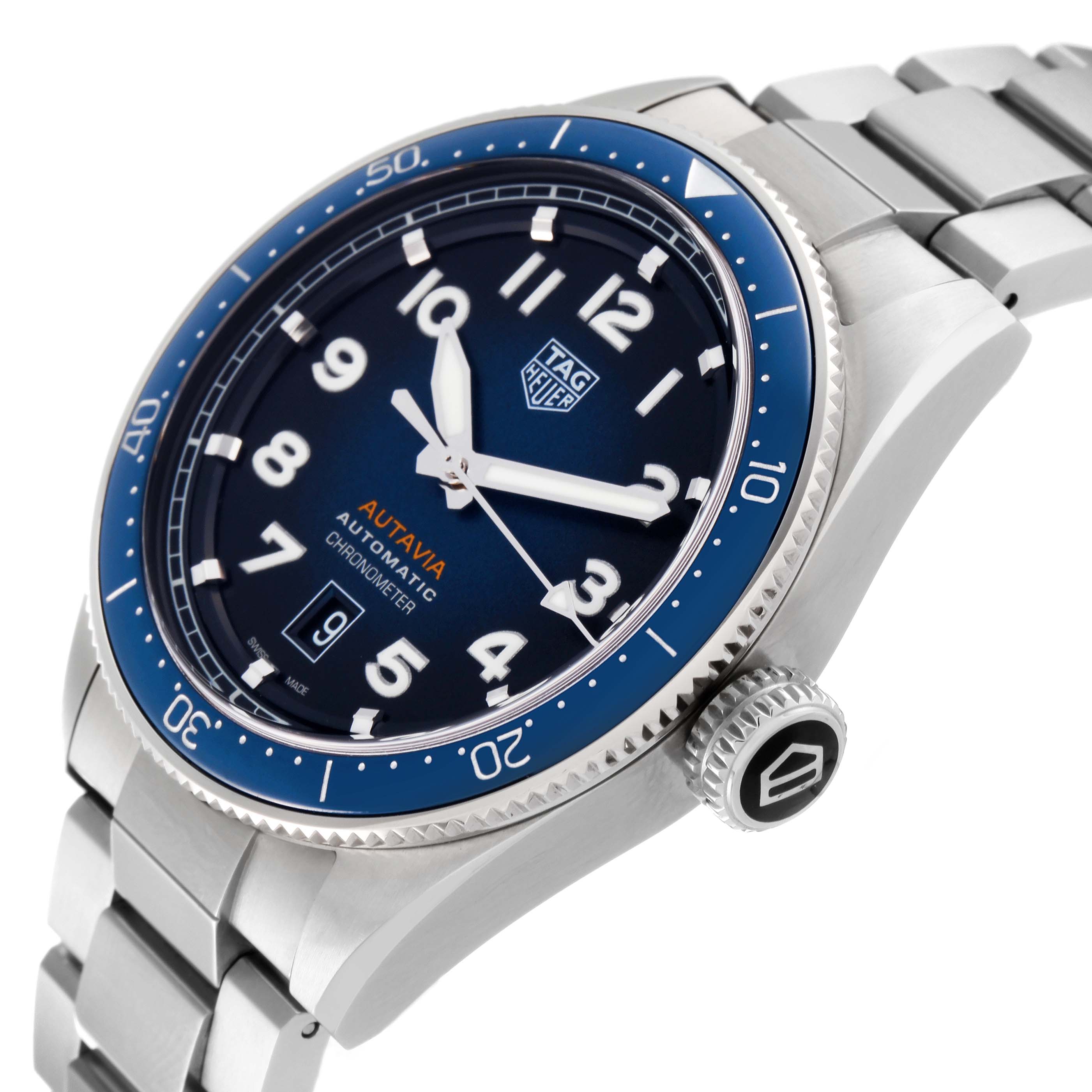 The image shows a Tag Heuer Autavia WBE5116.EB0173 Men's Stainless Steel Blue Dial WBE5116.EB0173 Men's Stainless Steel Blue Dial watch at an angle displaying its face, bezel, crown, and part of the bracelet.