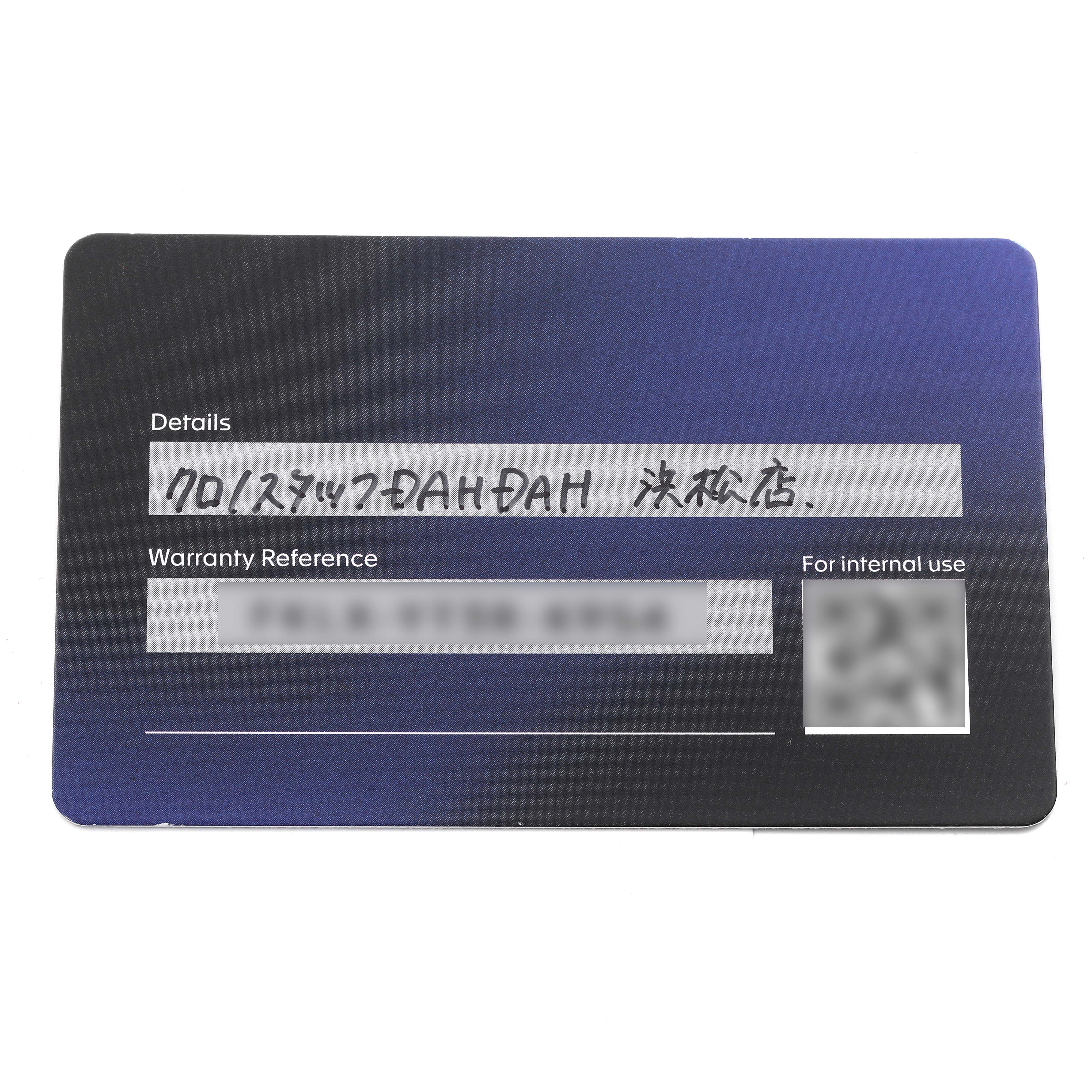 This image shows the warranty card for a Tag Heuer Limited Edition CBN2A1F.FC6492 Men
s Stainless Steel Grey Dial CBN2A1F.FC6492 Men
s Stainless Steel Grey Dial watch, photographed from a top-down angle.