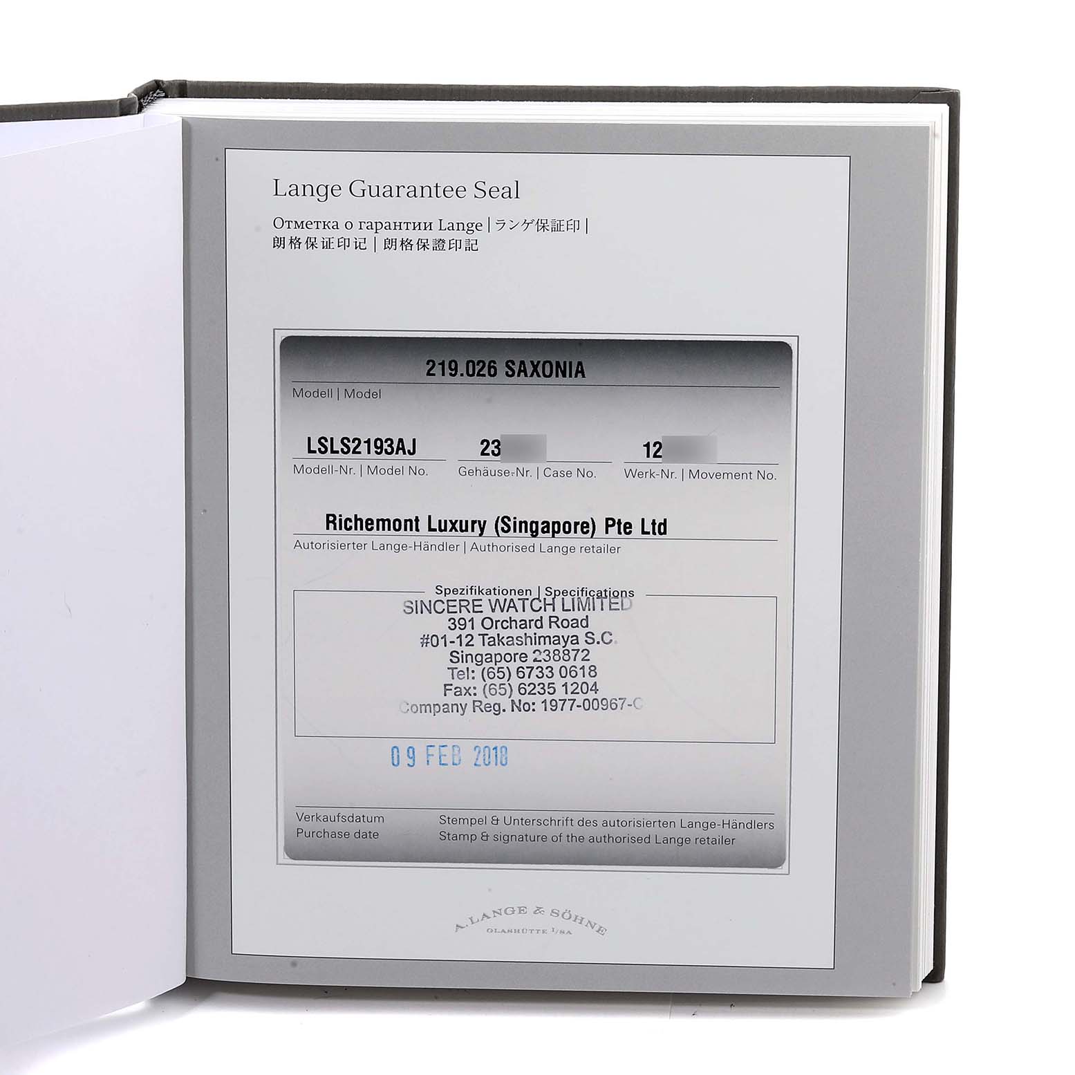 The image shows the Lange Guarantee Seal document for the Saxonia model by A. Lange 
Söhne, showcasing details like the model number and retailer info.