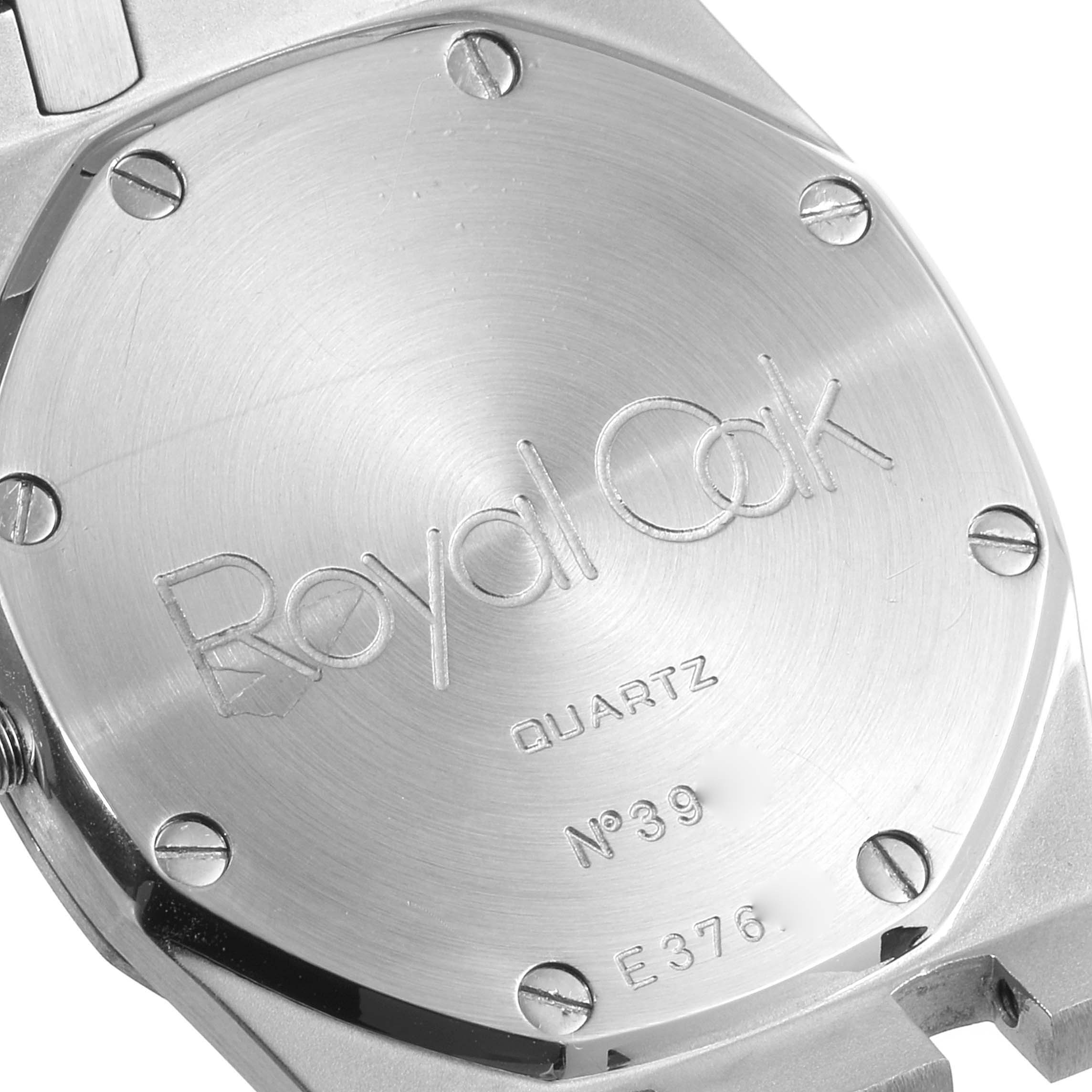 This image shows the back case of a Royal Oak watch by Audemars Piguet, highlighting the engraved details and screws.