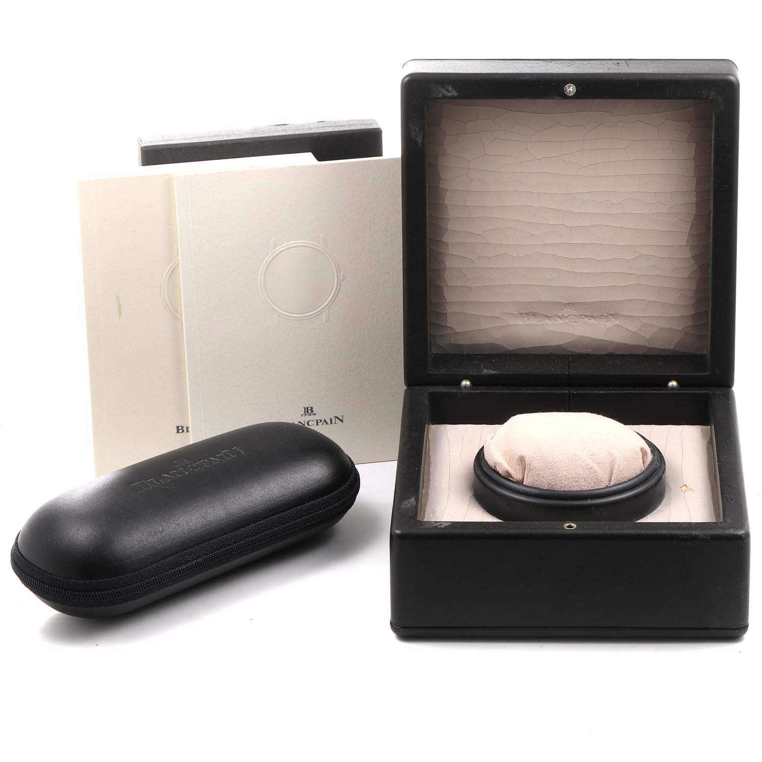 The image shows a Blancpain Fifty Fathoms 2250-1130-71 Men's Stainless Steel Black Dial 2250-1130-71 Men's Stainless Steel Black Dial watch box, with a black case, cushion, and two booklets.