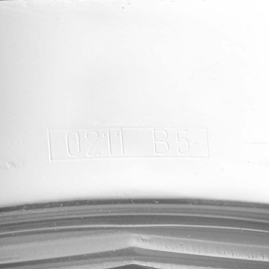 Close-up of the inner part of the Breitling Superocean A13340 Men
s Stainless Steel Black Dial A13340 Men
s Stainless Steel Black Dial watch featuring stamped markings.