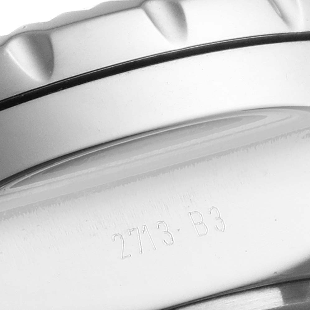 This close-up image of the Breitling Bentley A44364 Men's Stainless Steel Black Dial A44364 Men's Stainless Steel Black Dial shows part of the watch case with serial engraving.