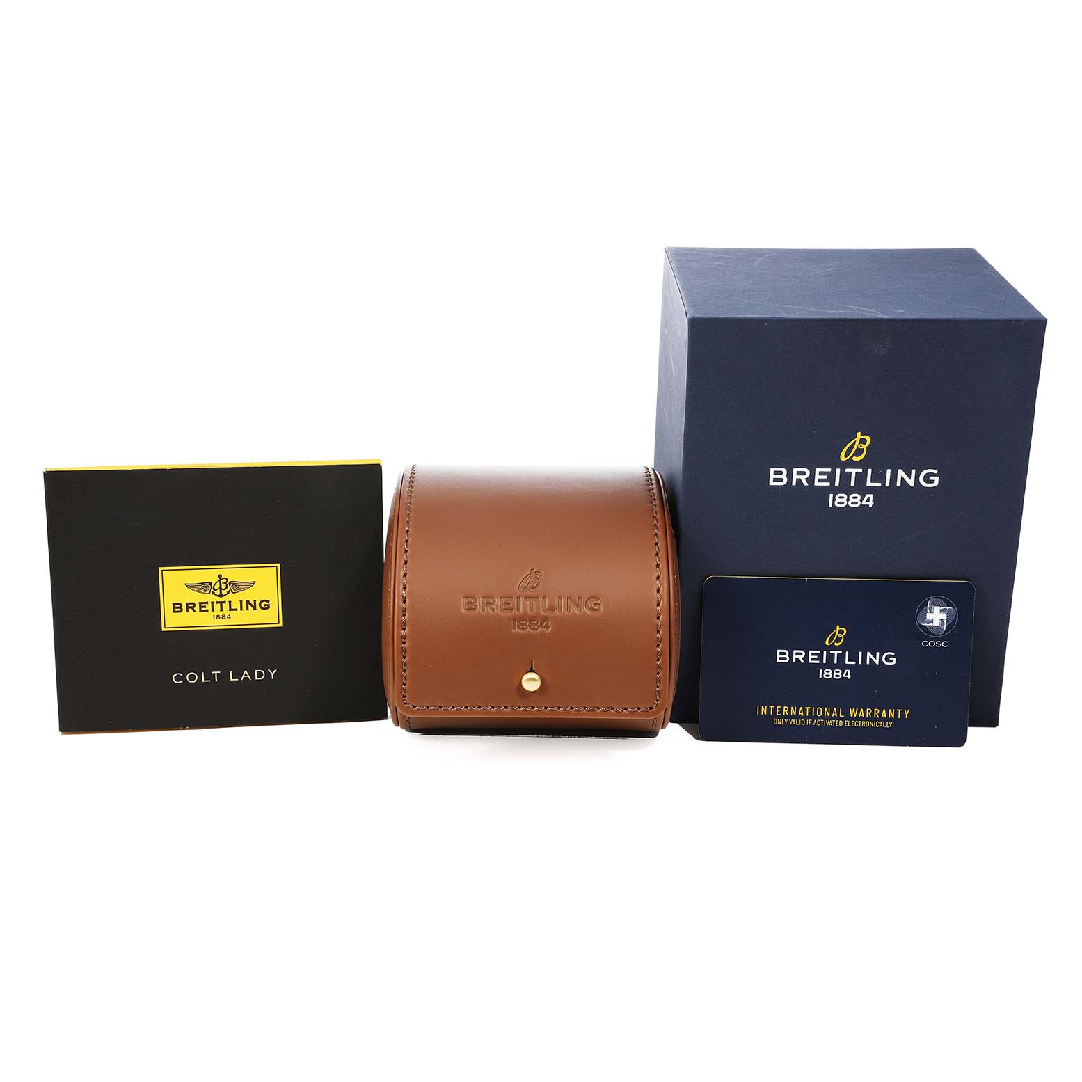 The image shows the packaging for a Breitling A77388 Women's Stainless Steel Black Dial Colt Lady Steel Black Dial A77388, including a box, pouch, manual, and warranty card.