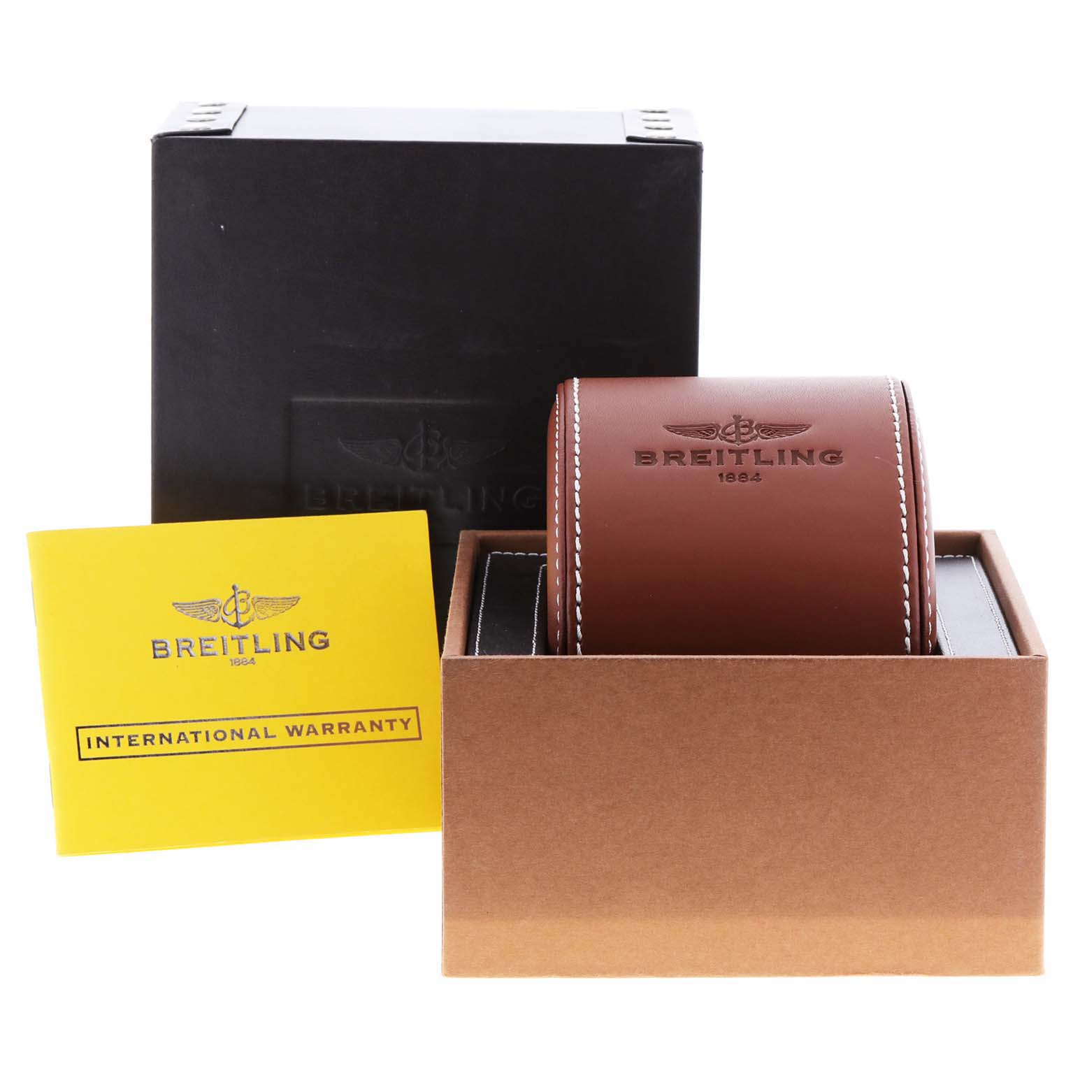 The image shows the Breitling Navitimer A23322 Men
s Stainless Steel Black Dial A23322 Men
s Stainless Steel Black Dial watch box, a leather case, and an international warranty card from a front angle.