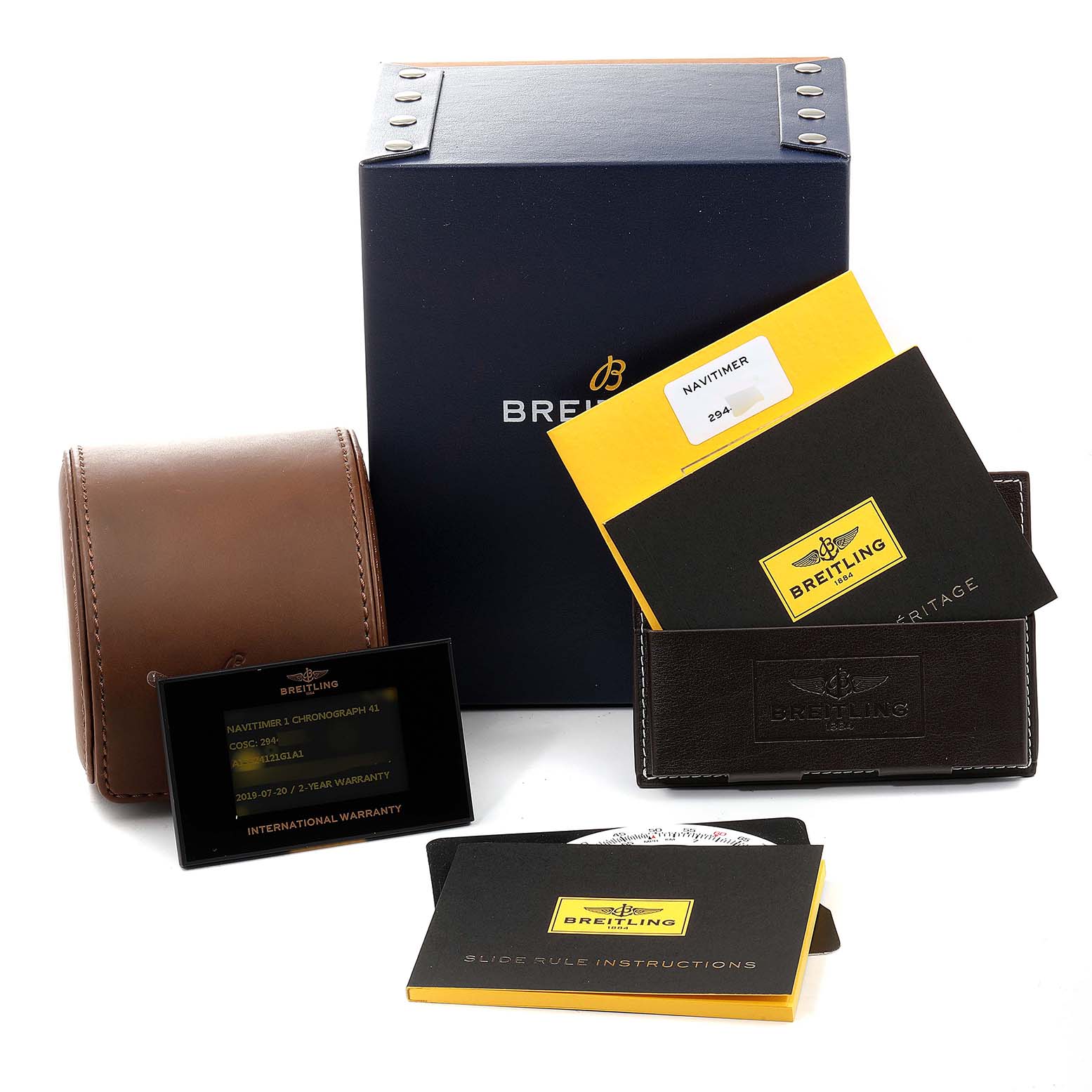 The image shows the box, leather case, international warranty card, and documentation for the Breitling Navitimer A13324 Men
s Stainless Steel Silver Dial A13324 Men
s Stainless Steel Silver Dial model.