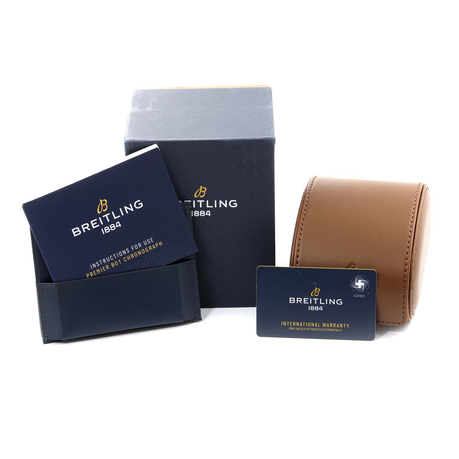 The image shows packaging, a booklet, an international warranty card, and a watch case for the Breitling Premier AB0118 Men's Stainless Steel Blue Dial AB0118 Men's Stainless Steel Blue Dial model.
