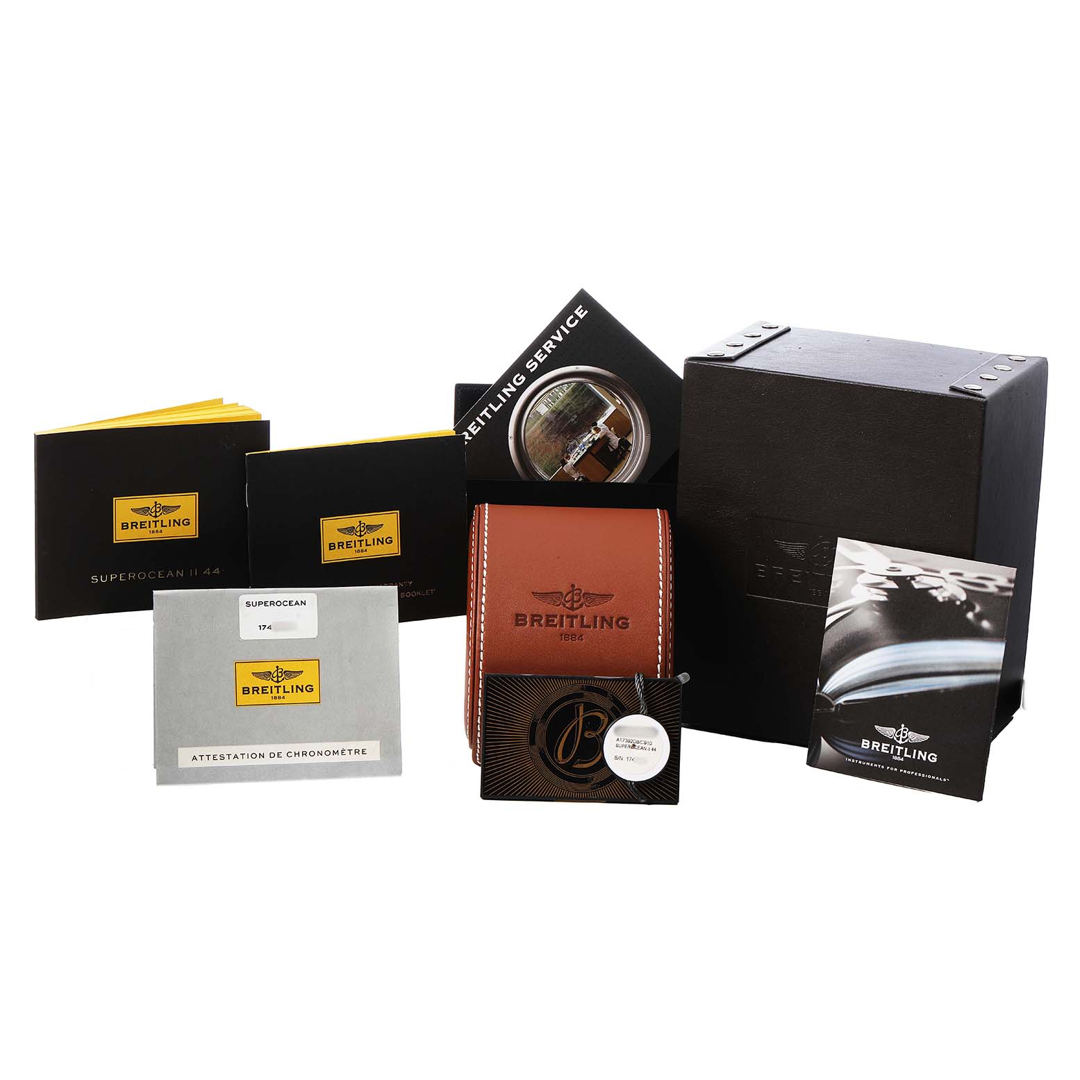 The image shows Breitling Superocean A17392 Men's Stainless Steel Blue Dial packaging, manuals, a certificate, and a leather watch case from various angles.