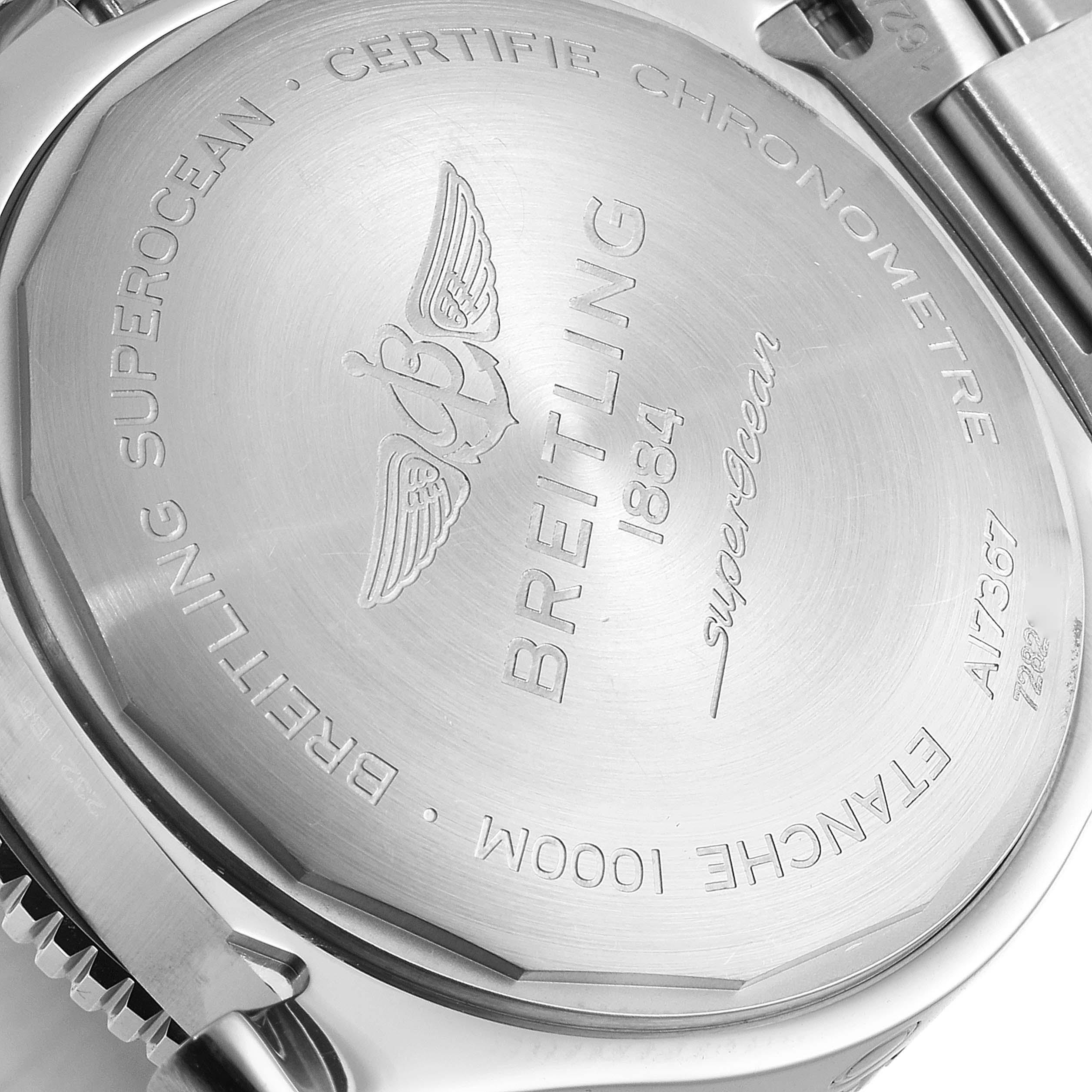 This image shows the back case of a Breitling Superocean A17367 Men's Stainless Steel Black Dial A17367 Men's Stainless Steel Black Dial watch, highlighting the brand engraving and specifications.