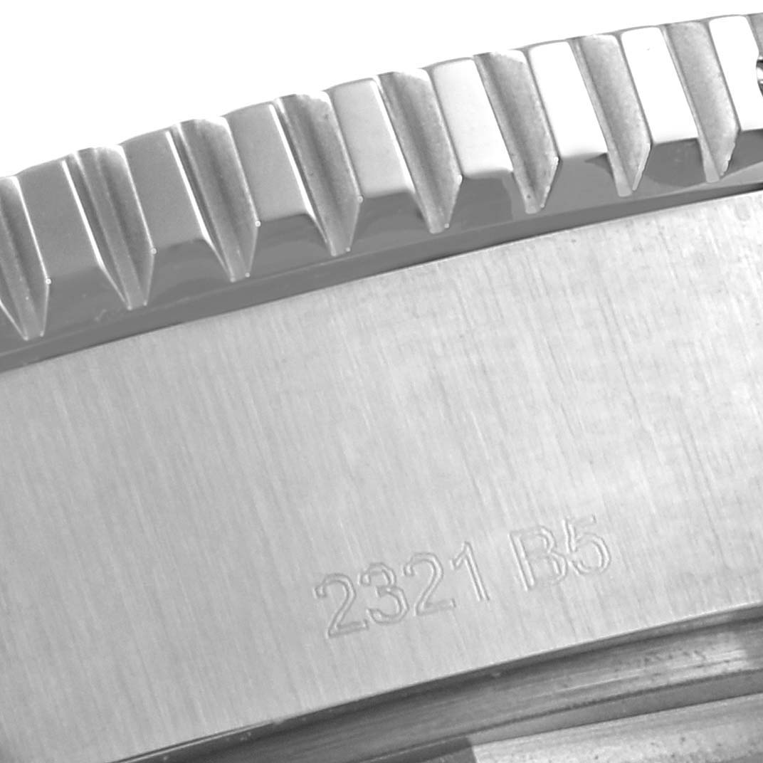This image shows a close-up of the grooved bezel edge and engraved serial number on the Breitling Superocean A17367 Men's Stainless Steel Black Dial A17367 Men's Stainless Steel Black Dial watch.