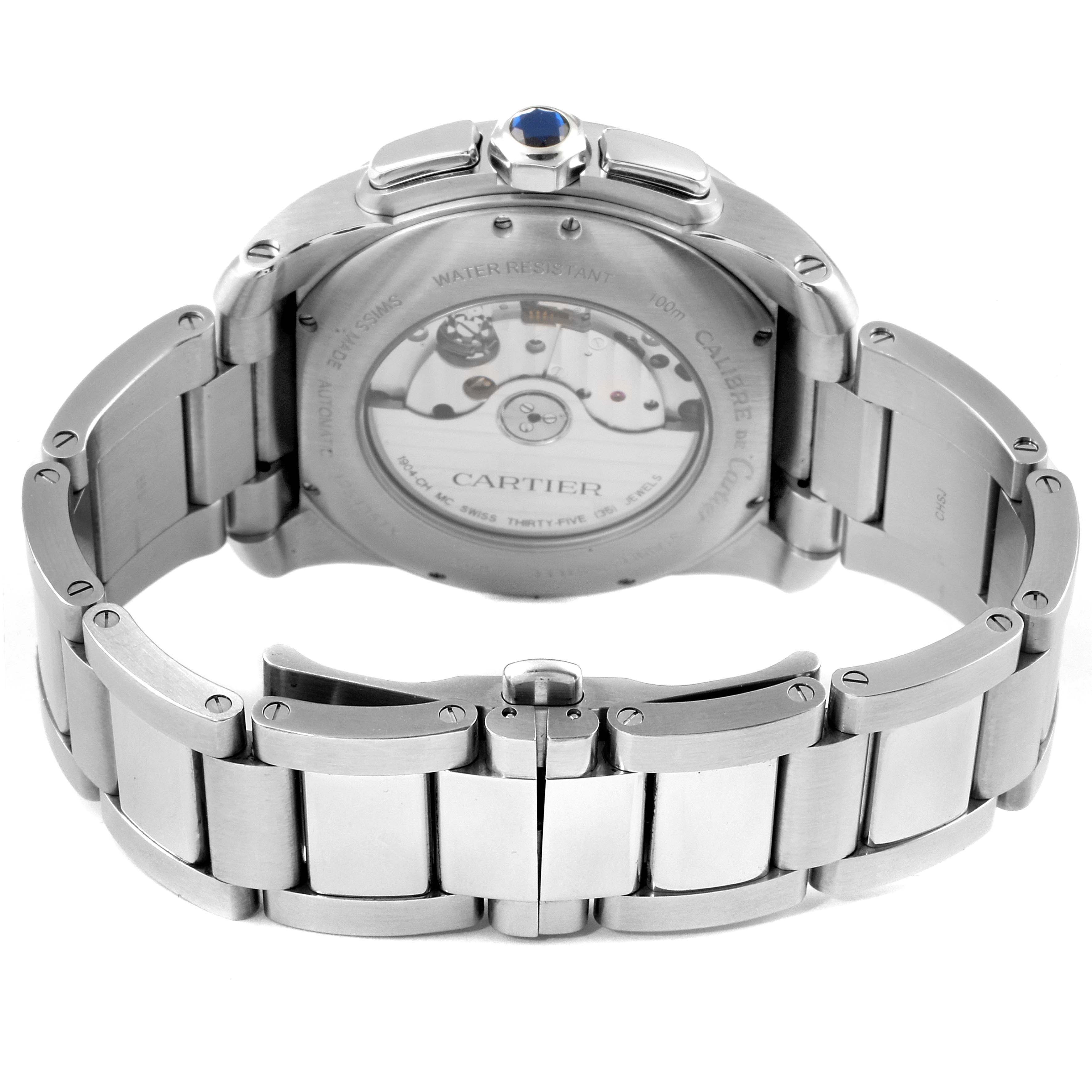 The image shows the back view of a Calibre de Cartier watch by Cartier, highlighting the case back, movement, and bracelet.