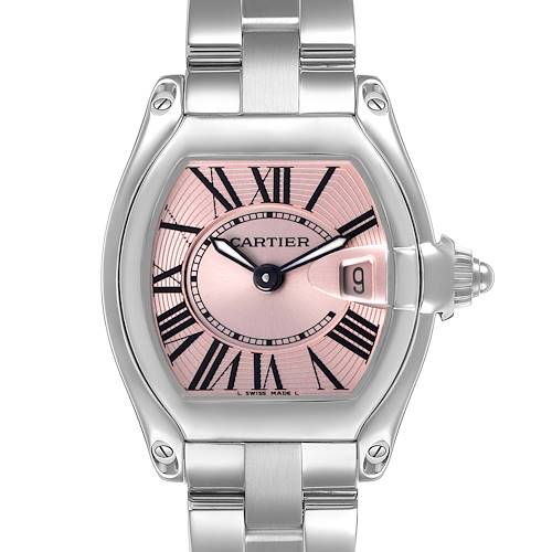 The Cartier Roadster W62017V3 Women's Stainless Steel Pink Dial watch is shown from the front, highlighting its pink dial, Roman numerals, date window, and metal bracelet.