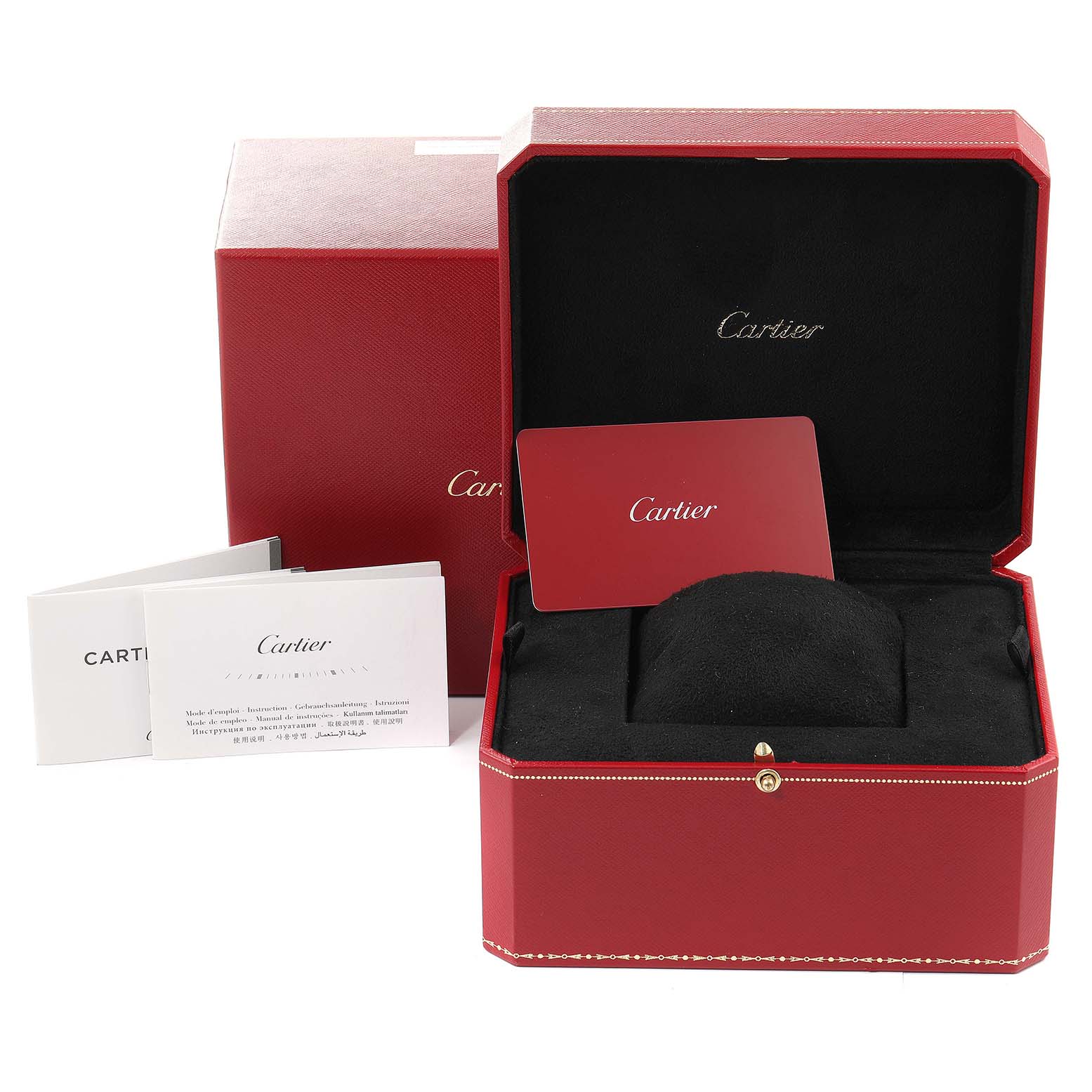 The image shows the red Cartier packaging box, warranty card, and booklet for the Santos Dumont model.