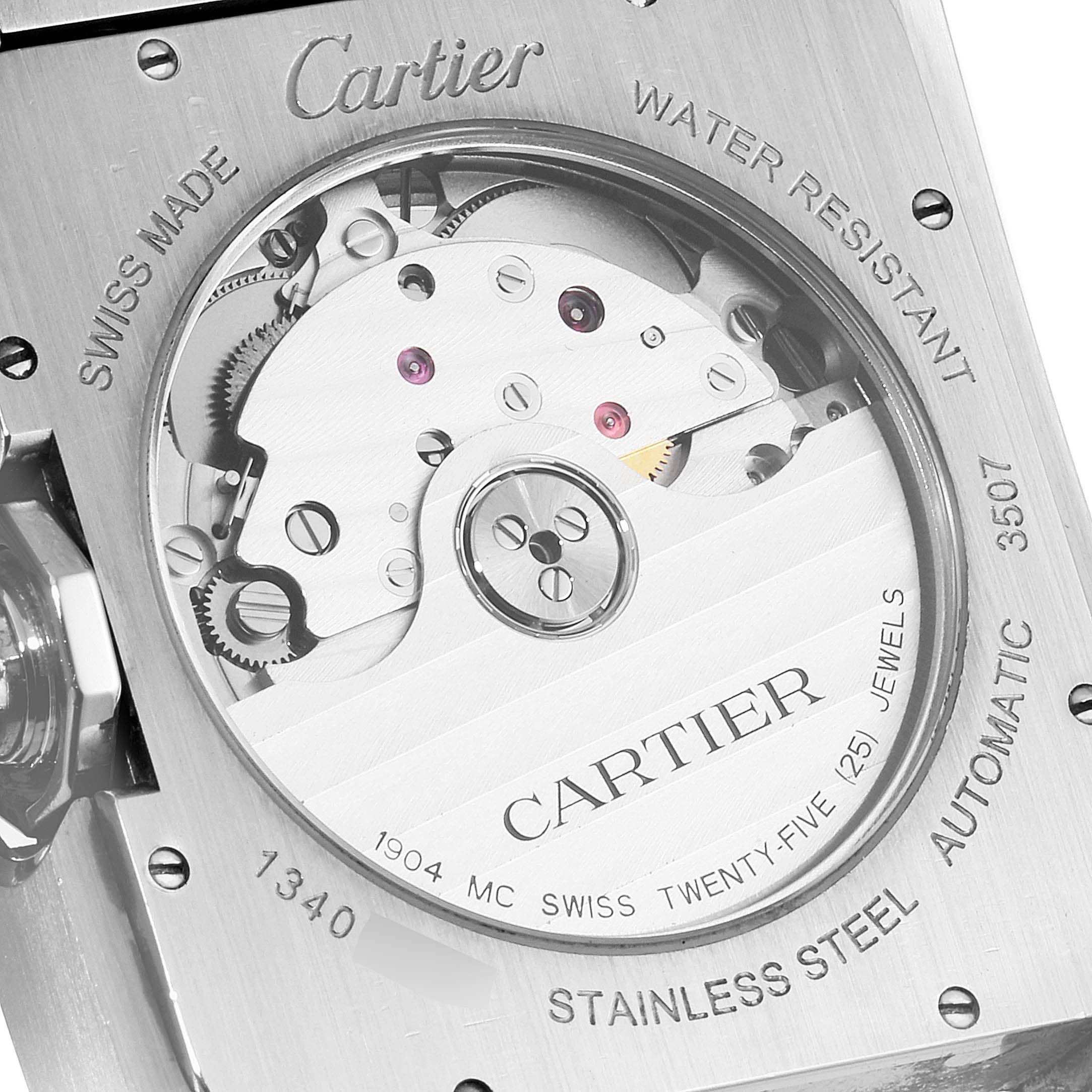 The image shows the back view of the Cartier Tank Anglaise W5310008 Men's Stainless Steel Silver Dial W5310008 Men's Stainless Steel Silver Dial watch, highlighting the internal mechanisms and engravings.