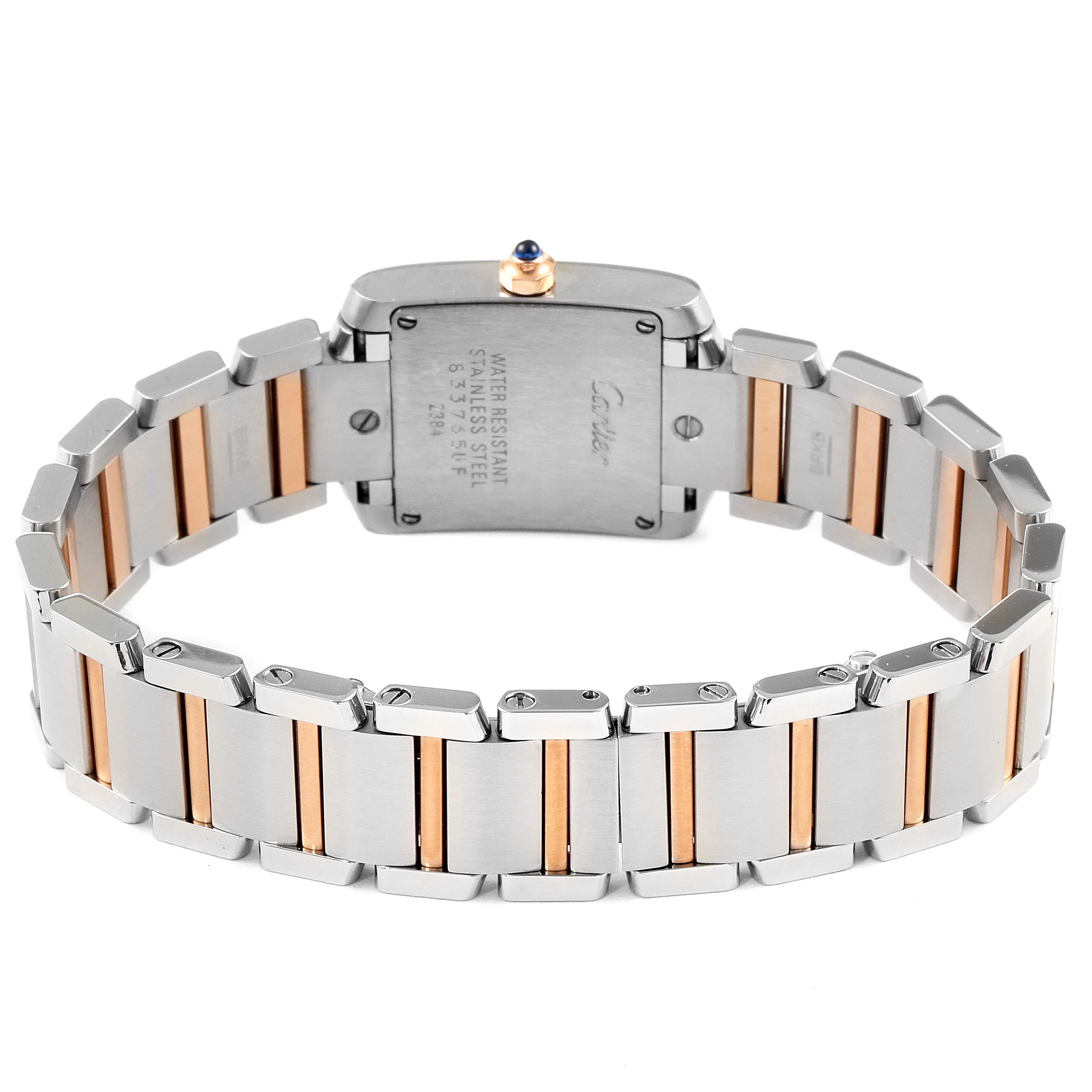 The image shows the back of a Cartier Tank Francaise W51027Q4 Women's Steel and Gold (two tone) Mother of Pearl Dial W51027Q4 Women's Steel and Gold (two tone) Mother of Pearl Dial watch, highlighting its metal bracelet and case back.