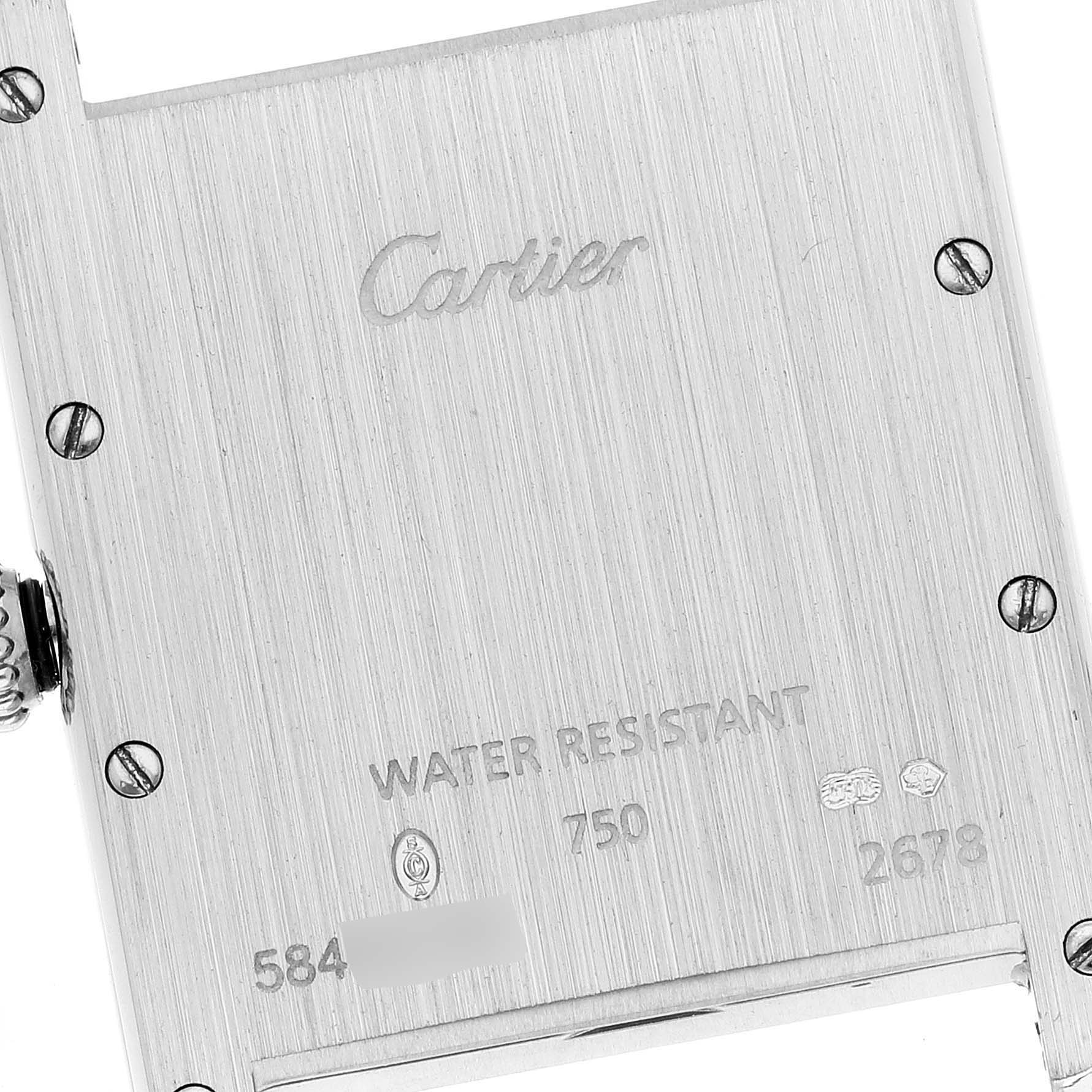 This image shows the back case of a Cartier Tank Louis W1540956 Men's White Gold Silver Dial W1540956 Men's White Gold Silver Dial watch at a close-up angle.