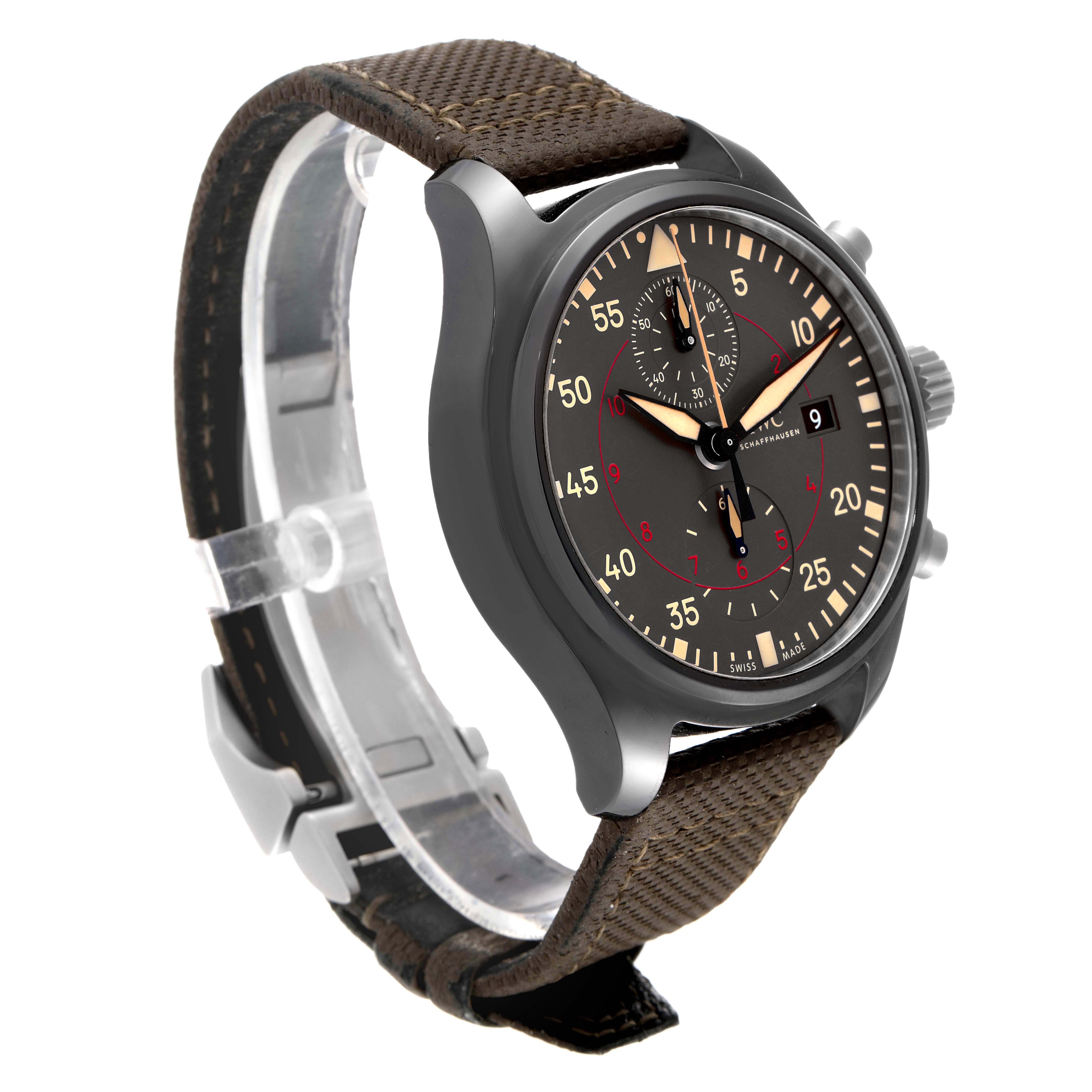 The image shows a side angle view of an IWC Pilot IW389002 Men's Ceramic Black Dial IW389002 Men's Ceramic Black Dial model watch, highlighting the dial, crown, and strap.