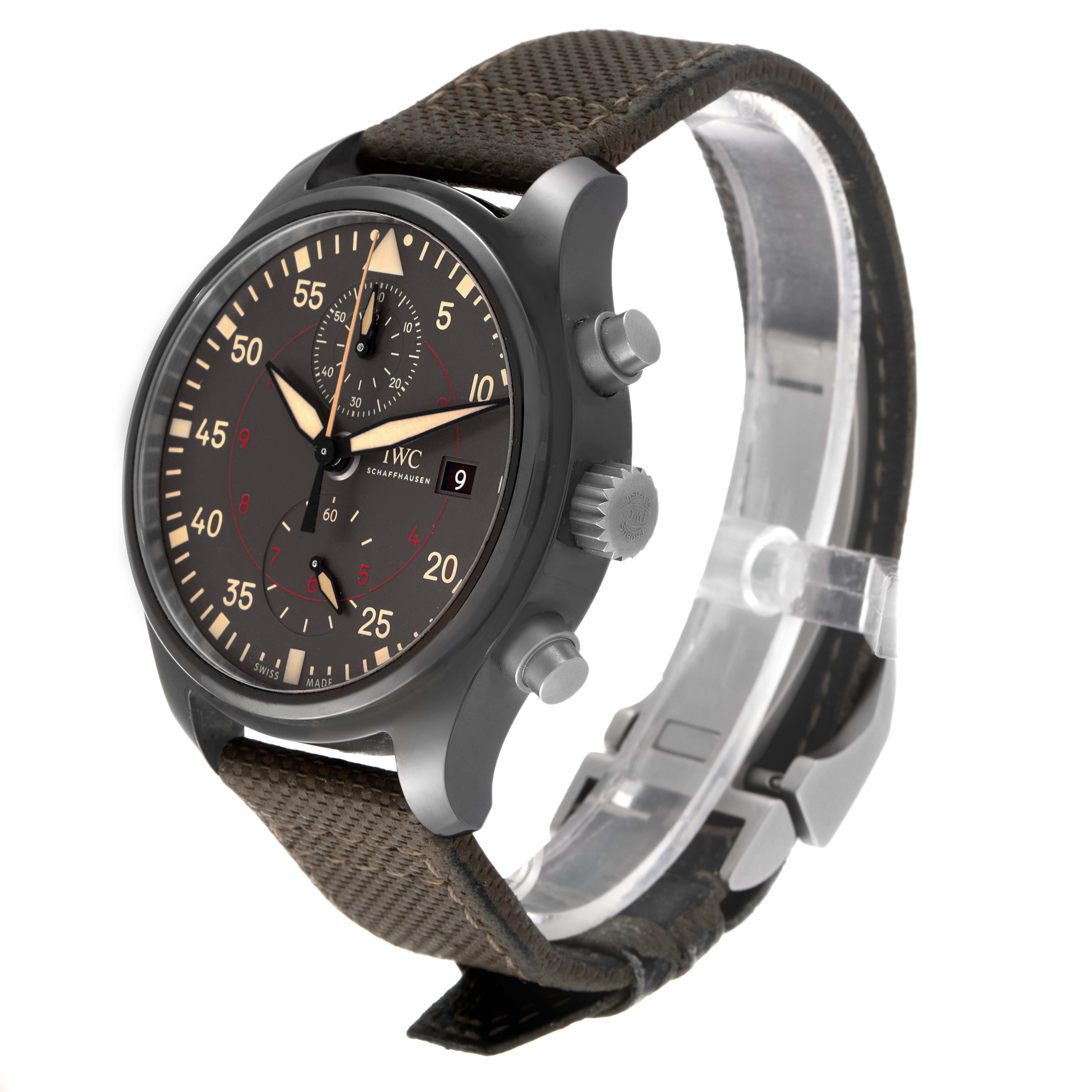 The IWC Pilot IW389002 Men's Ceramic Black Dial IW389002 Men's Ceramic Black Dial model watch is shown from an oblique angle highlighting its face, crown, pushers, and strap.