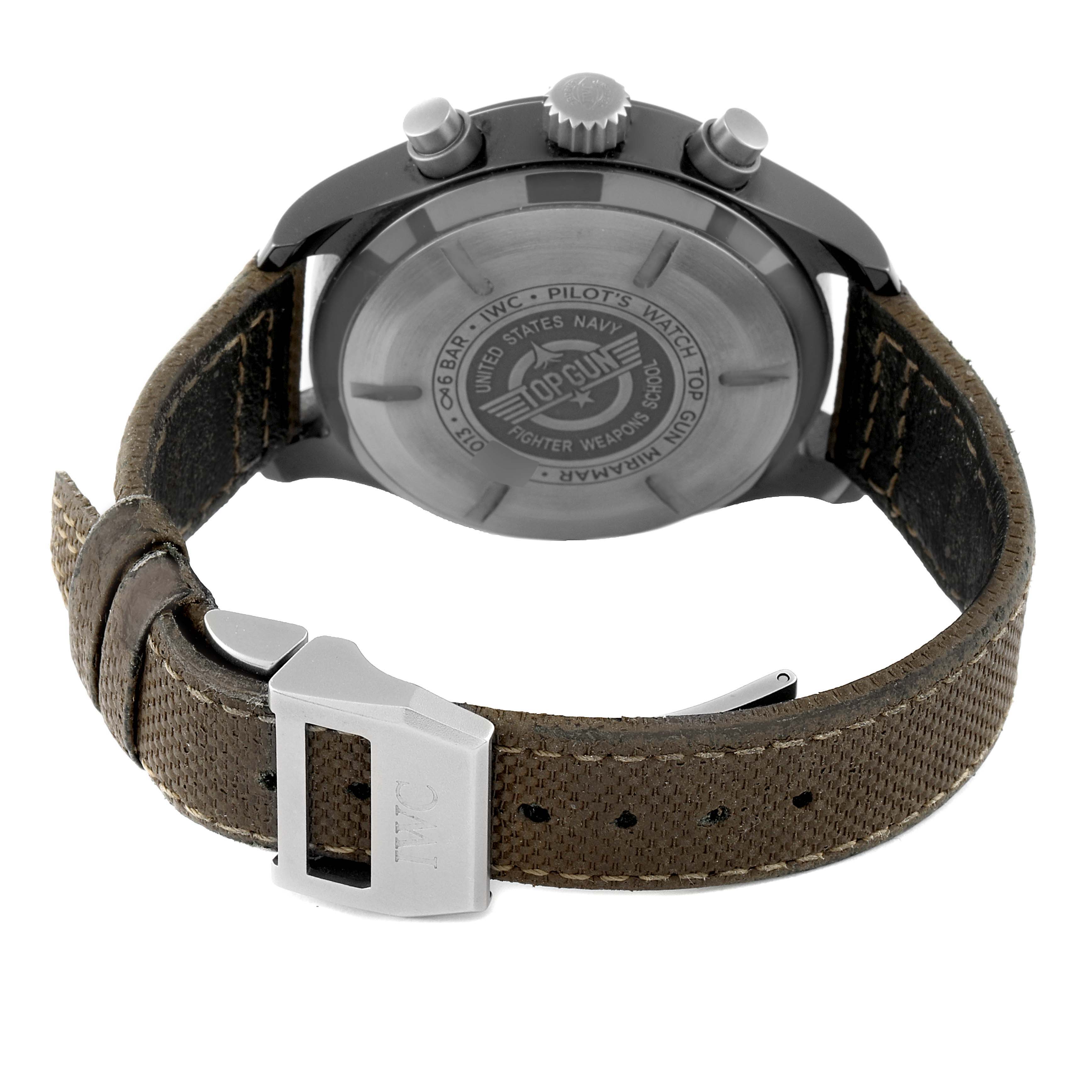 The image shows the back casing and strap of an IWC Pilot IW389002 Men's Ceramic Black Dial IW389002 Men's Ceramic Black Dial model watch, highlighting the "Top Gun" marking and textured leather strap.