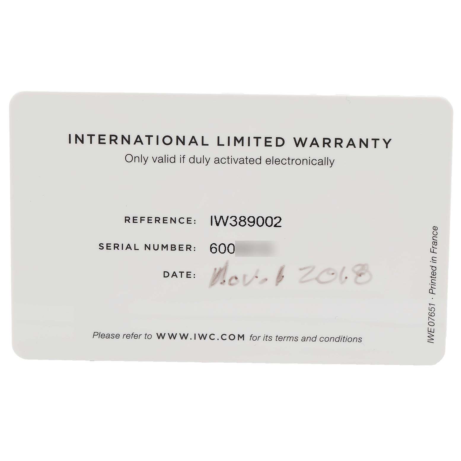 This image shows an international limited warranty card for the IWC Pilot IW389002 Men's Ceramic Black Dial IW389002 Men's Ceramic Black Dial model IW389002, including its reference, serial number, and date.