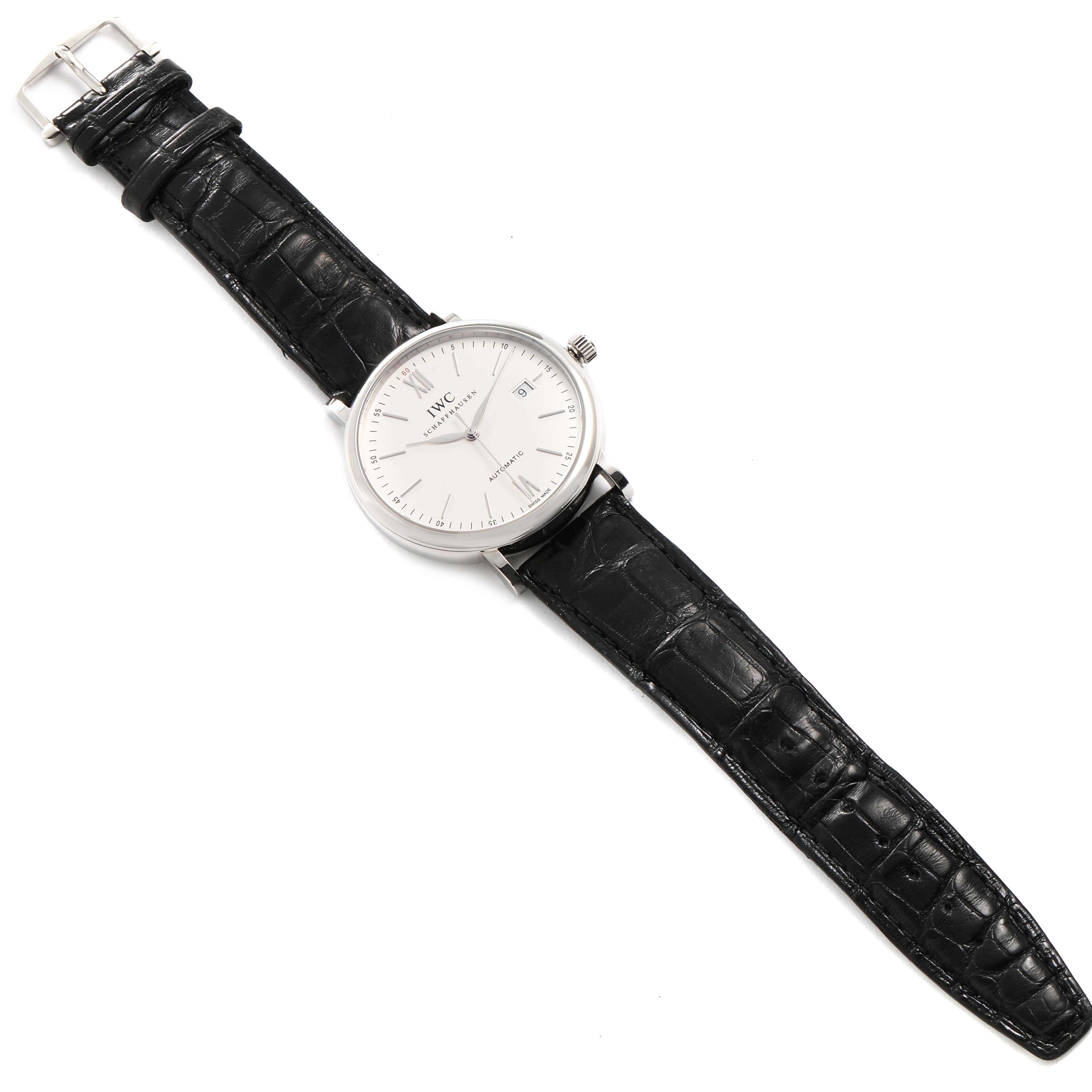 The image shows an overhead view of an IWC Portofino IW356501 Men's Stainless Steel Silver Dial IW356501 Men's Stainless Steel Silver Dial watch with a black crocodile leather strap and a white dial.