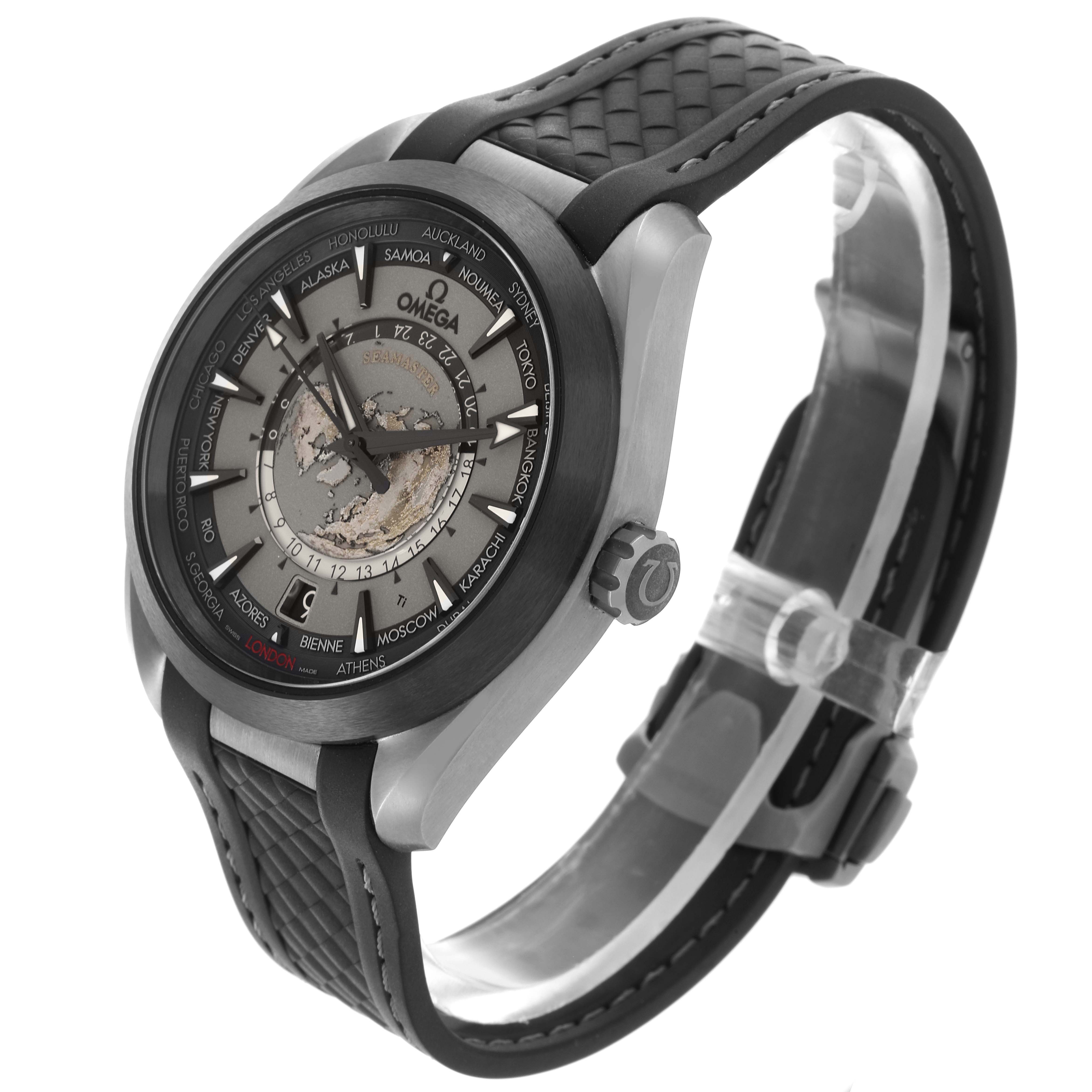 The Omega Aqua Terra 220.92.43.22.99.001 Men's Titanium Black Dial watch is shown at an angled side view, highlighting its face, bezel, crown, and textured strap.