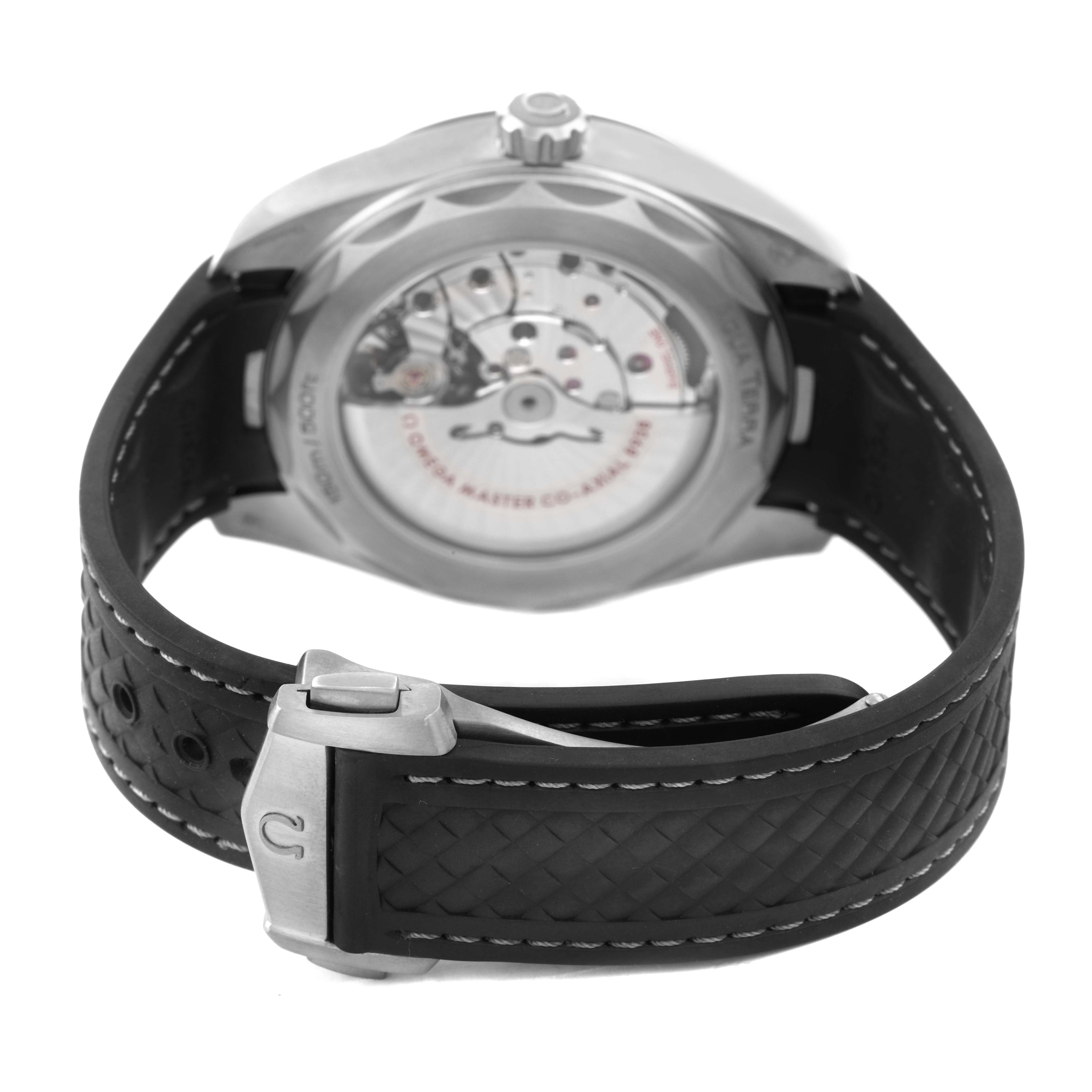 The Omega Aqua Terra 220.92.43.22.99.001 Men's Titanium Black Dial watch is shown from the back, highlighting the movement and strap clasp.