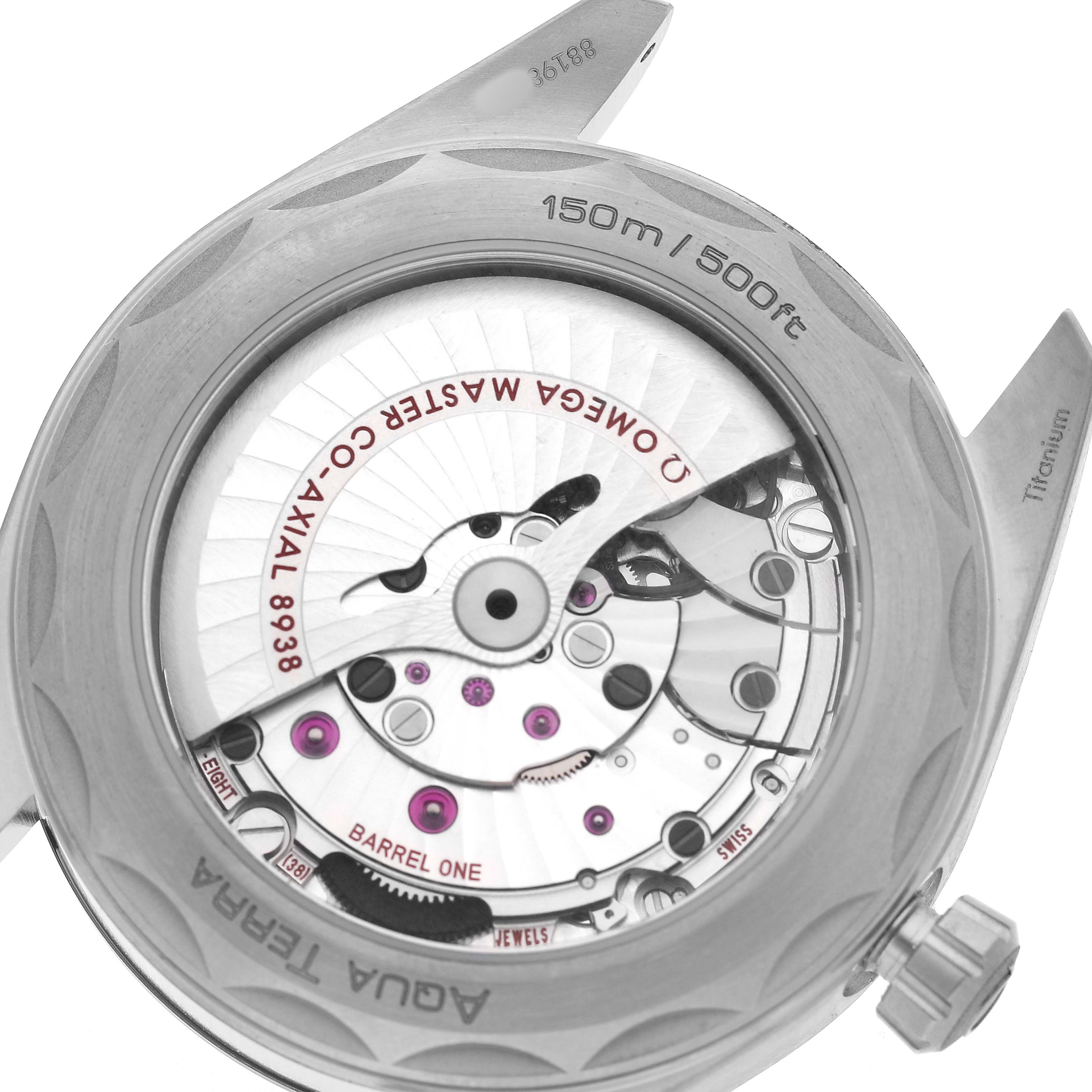 The image shows the back case of the Omega Aqua Terra 220.92.43.22.99.001 Men's Titanium Black Dial watch, displaying the inner mechanism and inscriptions.
